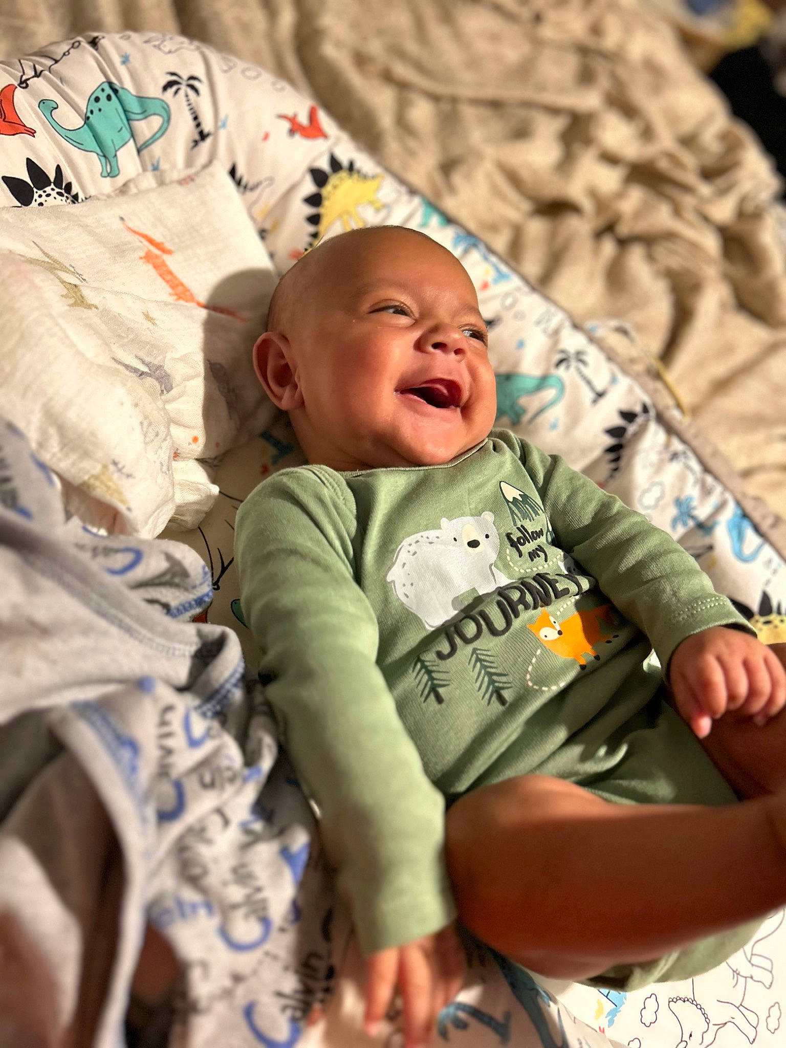 Elijah joined the competition — help win amazing prizes! baby, child, comfort, event, eye, face, facial_expression, fun, happy, head, human, human_body, linens, military_camouflage, person, product, skin, sleeve, smile, textile