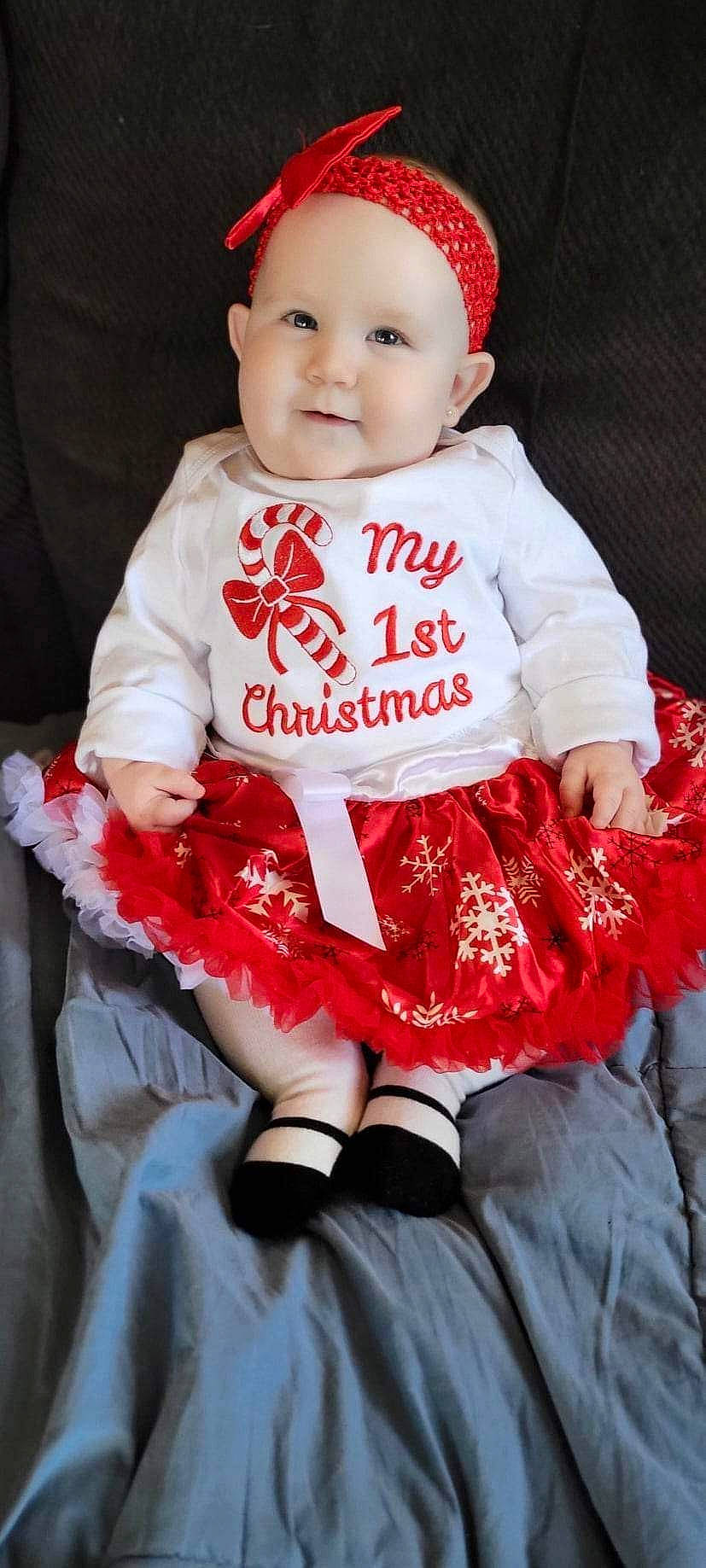 Audrey joined the competition — help win amazing prizes! baby, baby_toddler_clothing, cap, cheek, child, costume, dress, eye, happy, headwear, joy, magenta, pattern, person, pink, red, sitting, skin, sleeve, smile