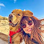 Sunny a rejoint le concours — aidez-le/la à gagner de superbes lots ! dog, golden_retriever, woman, sunglasses, red_harness, beach, sand, smile, happy, outdoor, sunny, blue_sky, pet, friendship, portrait, close_up, fur, hair, leisure, nature