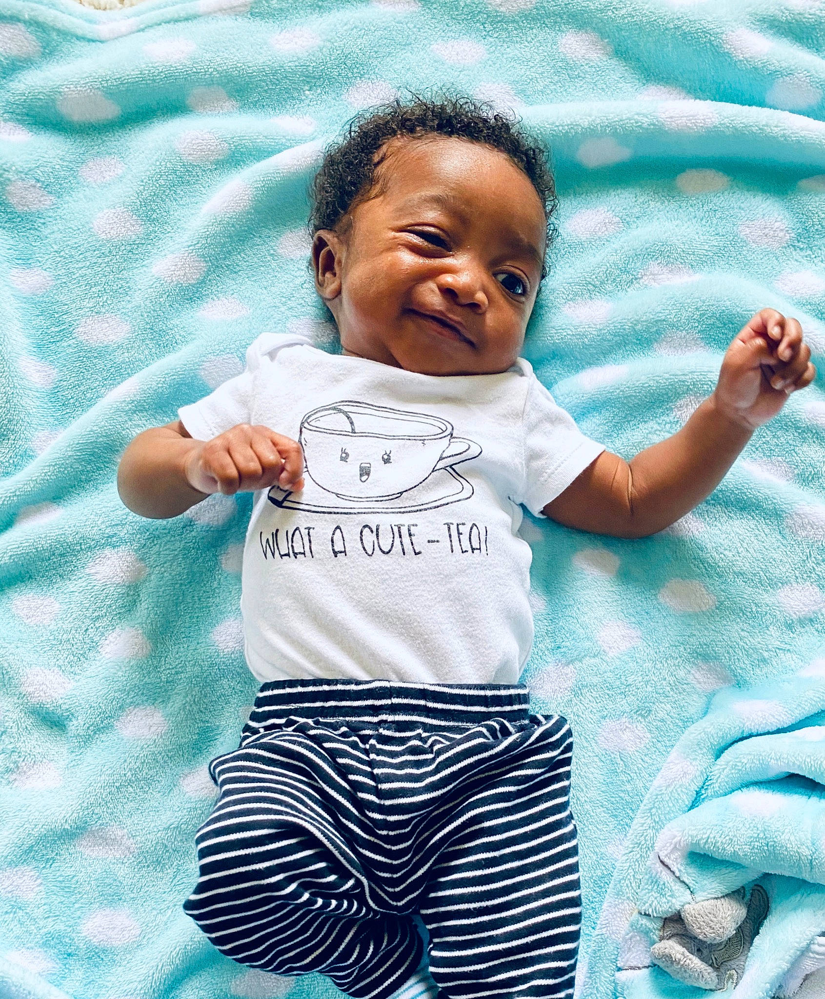 Elian joined the competition — help win amazing prizes! baby, blue, child, cool, facial_expression, fun, gesture, happy, person, photography, play, product, smile, t_shirt, toddler, turquoise, vacation, water