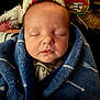 Beau joined the competition — help win amazing prizes! baby, sleeping, blanket, blue, face, child, indoor, closeup, cozy, toy, infant, peaceful, wrapped, soft, person, head, cute, rest, young, nursery