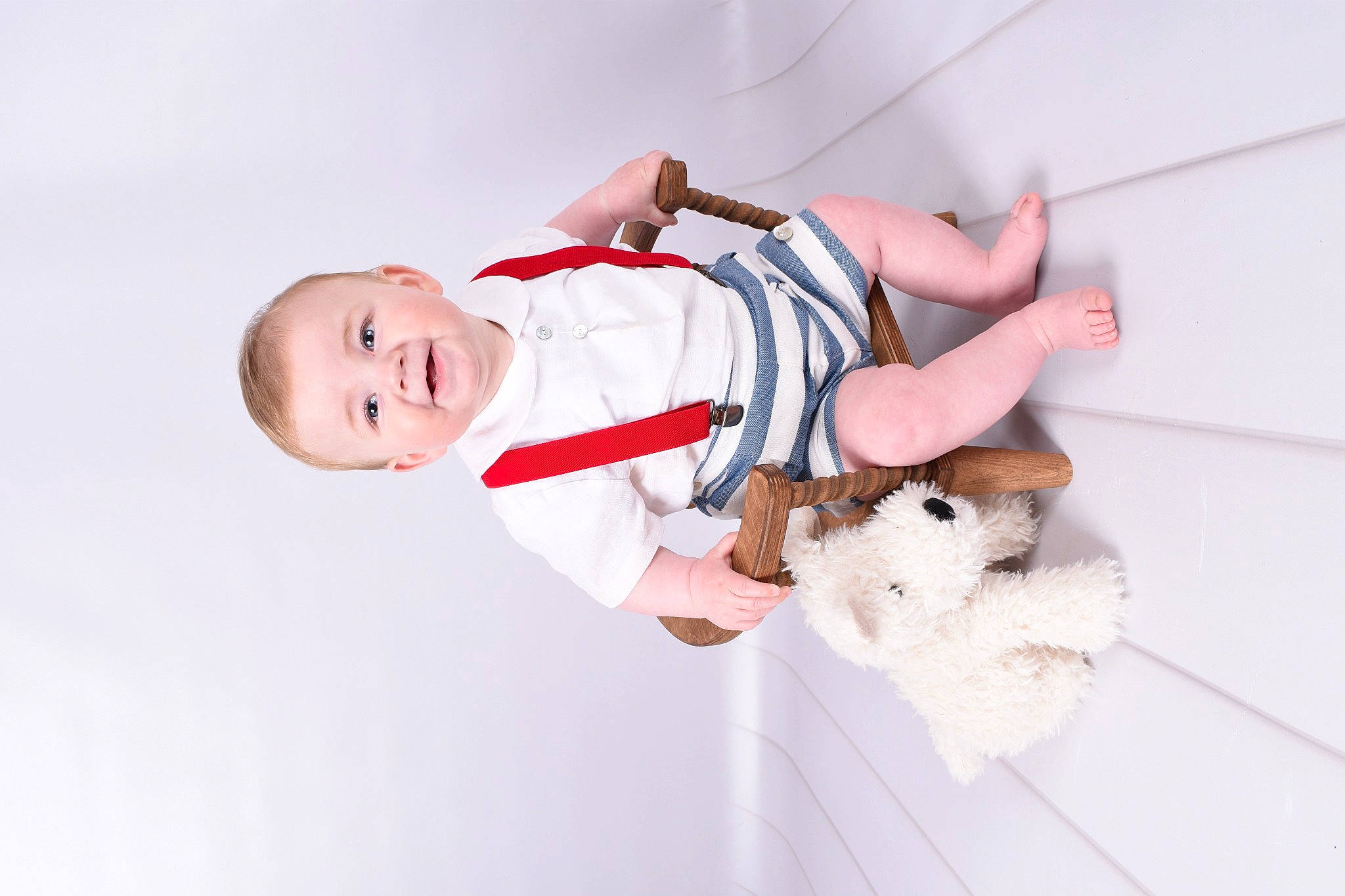Rudi joined the competition — help win amazing prizes! baby, baby_products, baby_toddler_clothing, child, comfort, companion_dog, elbow, fun, fur, happy, human_leg, joy, knee, person, room, sleeve, smile, stuffed_toy, teddy_bear, thigh