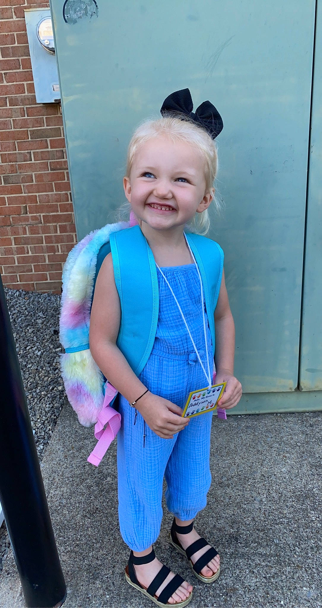 Addyson is registered to the contest to win money with this photo: arm, azure, baby_toddler_clothing, clothing, electric_blue, eye, face, fun, hair, happy, iris, joy, leisure, magenta, person, personal_protective_equipment, pink, purple, recreation, sleeve