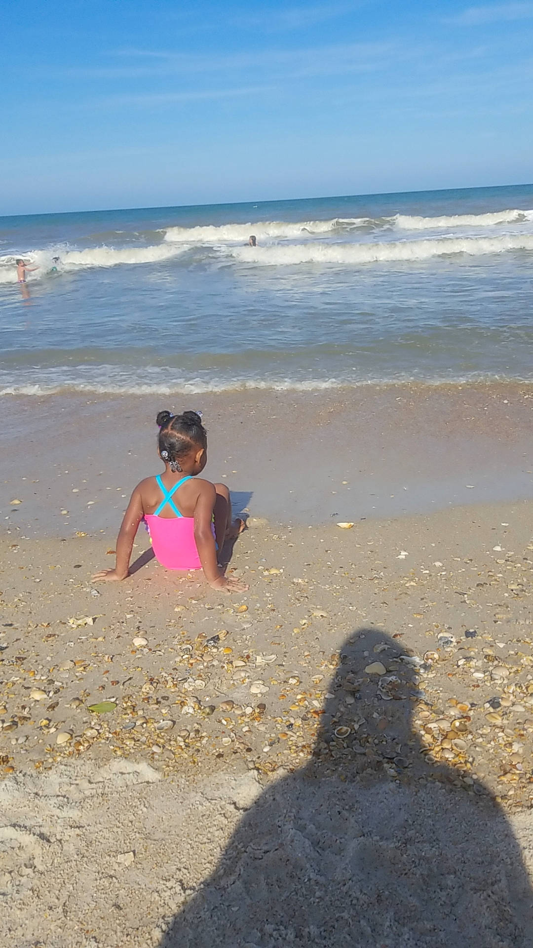 Jazlynn is registered to the contest to win money with this photo: azure, barefoot, beach, coastal_and_oceanic_landforms, fun, happy, horizon, leg, leisure, morning, natural_environment, people_in_nature, people_on_beach, person, sand, shore, sky, swimwear, vertebrate, water