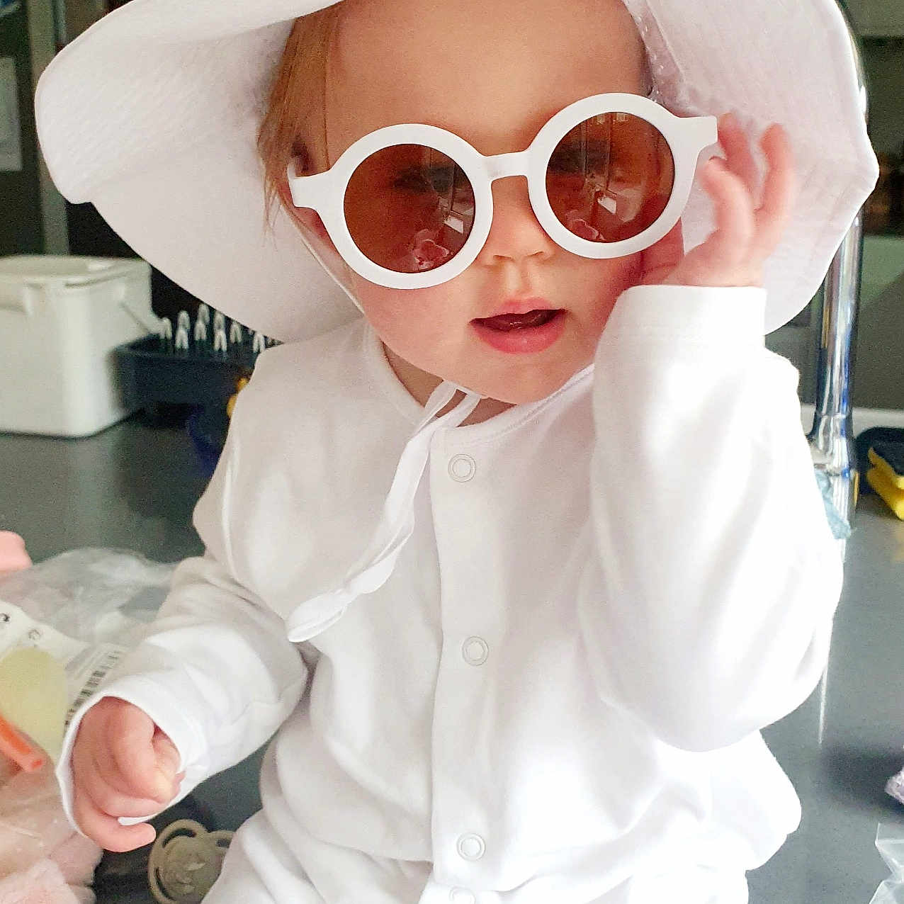 Isabella joined the competition — help win amazing prizes! accessories, baby, bodypart, bonnet, cap, clothing, coat, face, finger, glasses, goggles, hand, hat, head, person, photography, portrait, shirt, sunglasses, sunhat