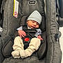 baby, infant, car_seat, evenflo, hat, clothing, straps, safety, newborn, cute, sleepy, child, seat, fabric, soft, hands, feet, indoor, portrait, person
