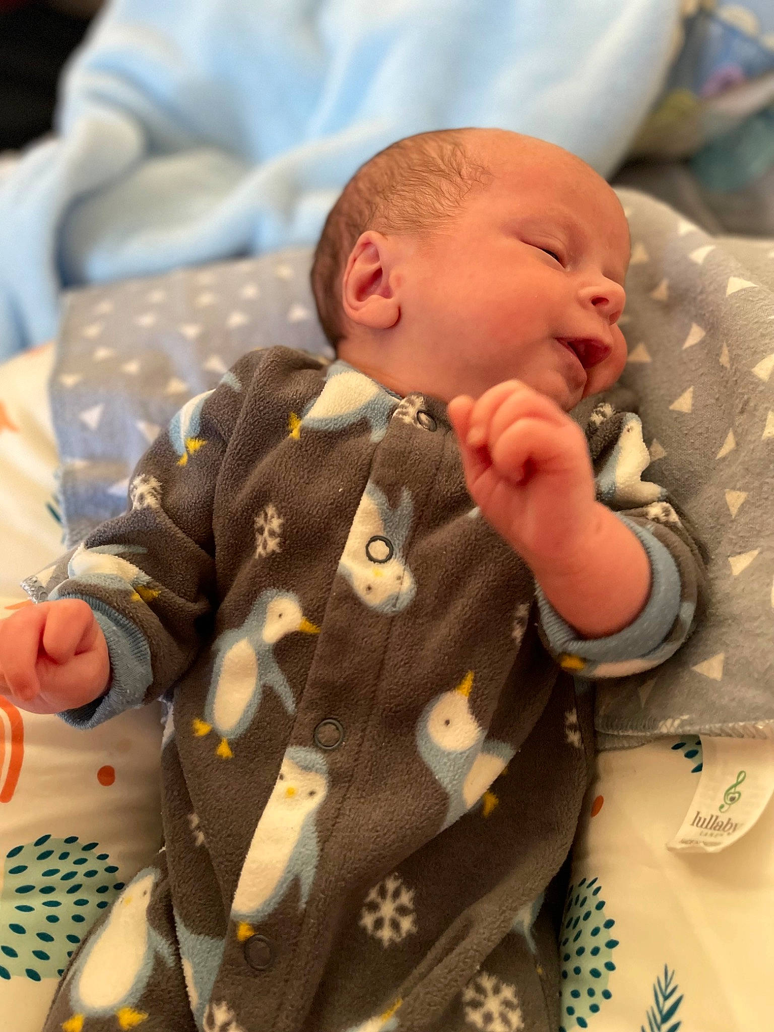 Zyaire joined the competition — help win amazing prizes! baby, baby_products, baby_sleeping, baby_toddler_clothing, bedtime, cheek, child, comfort, finger, gesture, linens, military_camouflage, nail, outerwear, pattern, person, skin, sleeve, textile, thumb