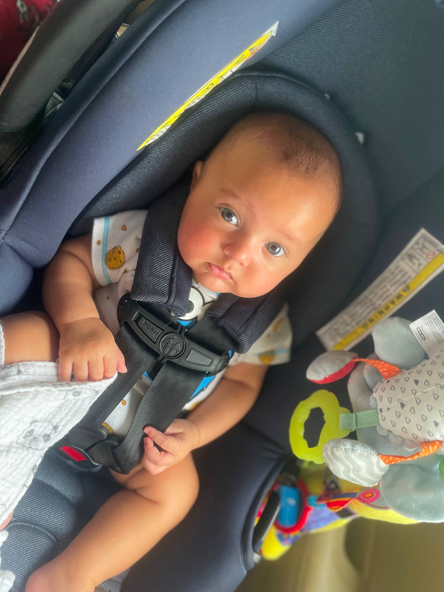 Jalen is registered to the contest to win money with this photo: auto_part, automotive_design, automotive_exterior, baby, baby_carriage, baby_in_car_seat, baby_products, car_seat, car_seat_cover, child, comfort, electric_blue, family_car, luxury_vehicle, motor_vehicle, person, seat_belt, sitting, thumb, toddler