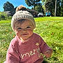 child, toddler, smiling, grass, outdoor, sweater, knitted_hat, pom_pom, sunny, daylight, nature, greenery, face, portrait, cute, happy, autumn, casual_clothing, baby, park