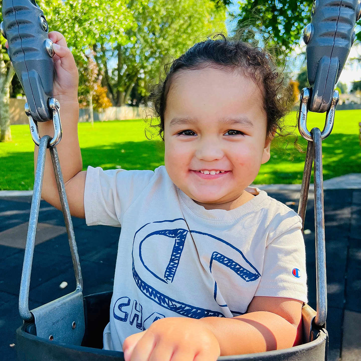 Christian joined the competition — help win amazing prizes! baby, clothing, face, grass, gun, happy, head, nature, outdoorplayarea, outdoors, park, person, photography, plant, playarea, portrait, smile, toy, tree, weapon