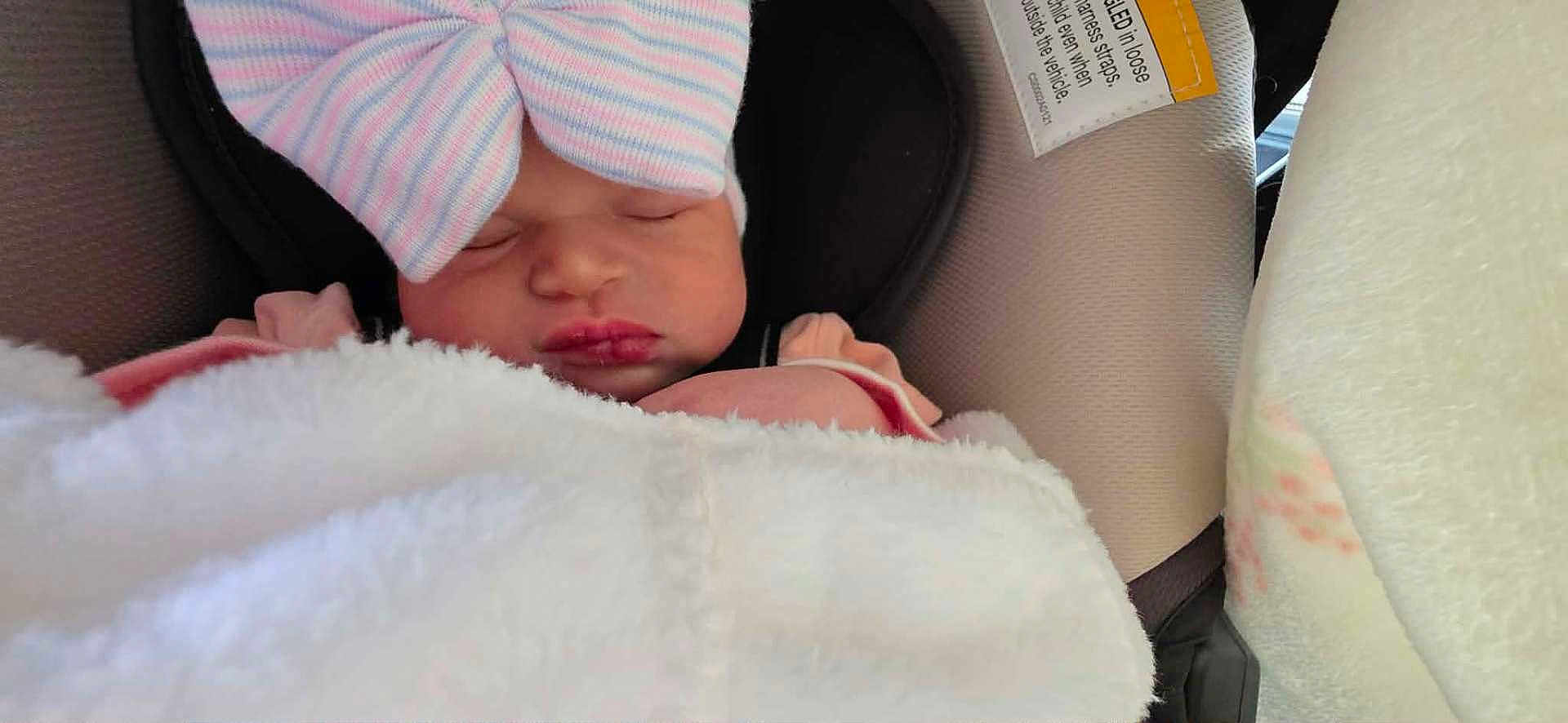 Alia joined the competition — help win amazing prizes! newborn, baby, sleeping, car_seat, blanket, hat, bow, infant, child, soft, cozy, resting, cute, pink, pastel, toddler, face, headwear, comfort, indoor