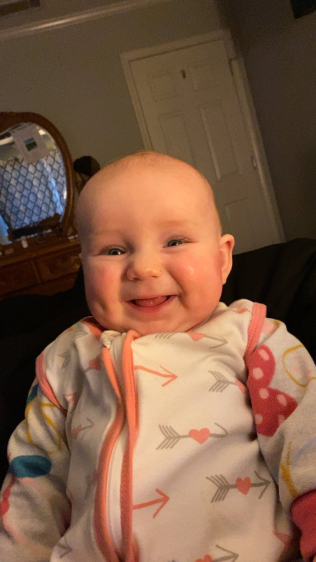 Kensleigh is registered to the contest to win money with this photo: baby, baby_toddler_clothing, cheek, child, chin, comfort, door, eye, face, hairstyle, happy, head, human_body, joy, mouth, person, room, sitting, skin, sleeve