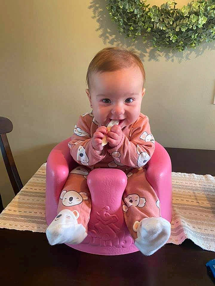 Vera is registered to the contest to win money with this photo: baby, child, person, pink, sitting, toddler