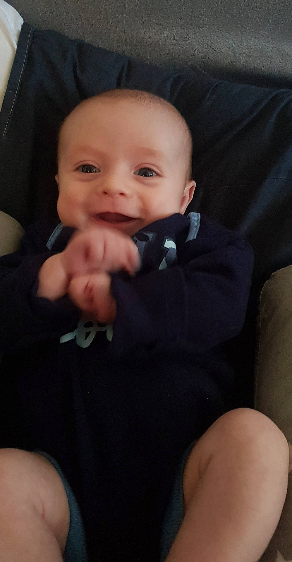 Ezra joined the competition — help win amazing prizes! baby, baby_carriage, baby_toddler_clothing, cheek, comfort, eye, eyebrow, face, finger, gesture, hair, head, human_body, iris, nose, person, seat_belt, skin, sleeve, smile