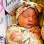 newborn, baby, sleeping, floral, blanket, headband, infant, portrait, closeup, soft, cozy, cute, child, wrapped, peaceful, indoors, person, flower, resting, warm