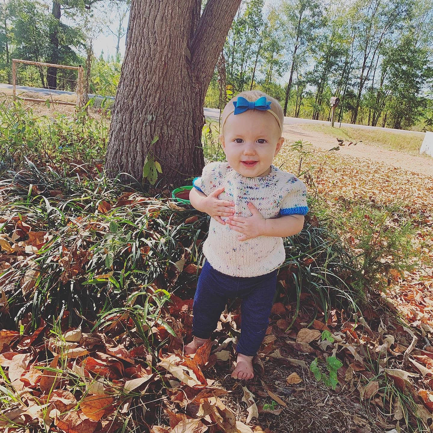 Chandler is registered to the contest to win money with this photo: adaptation, baby, baby_toddler_clothing, botany, cap, child, deciduous, grass, grass_family, happy, hat, headwear, joy, leaf, natural_landscape, people_in_nature, person, plant, smile, standing