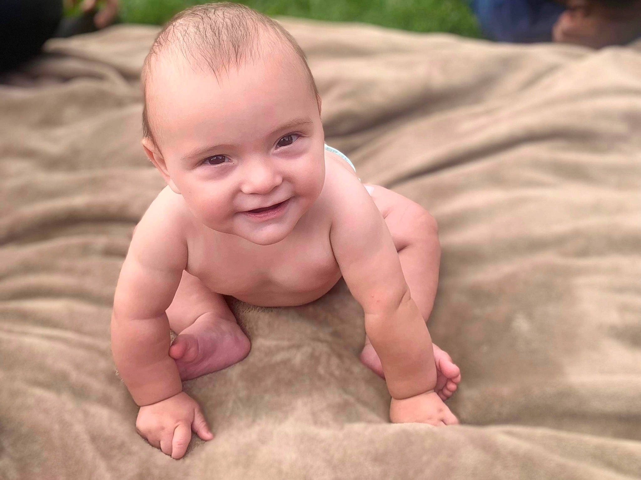 Jake is registered to the contest to win money with this photo: baby, barefoot, cheek, chest, chin, comfort, face, foot, fun, grass, hand, happy, head, joy, leg, mouth, person, skin, smile, stomach