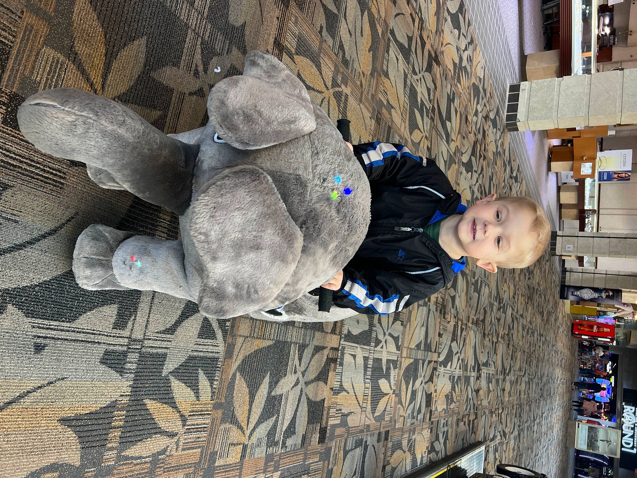 Xavier joined the competition — help win amazing prizes! art, building, electric_blue, joy, pattern, person, sitting, smile, street, toddler, travel, tree, visual_arts, winter, working_animal