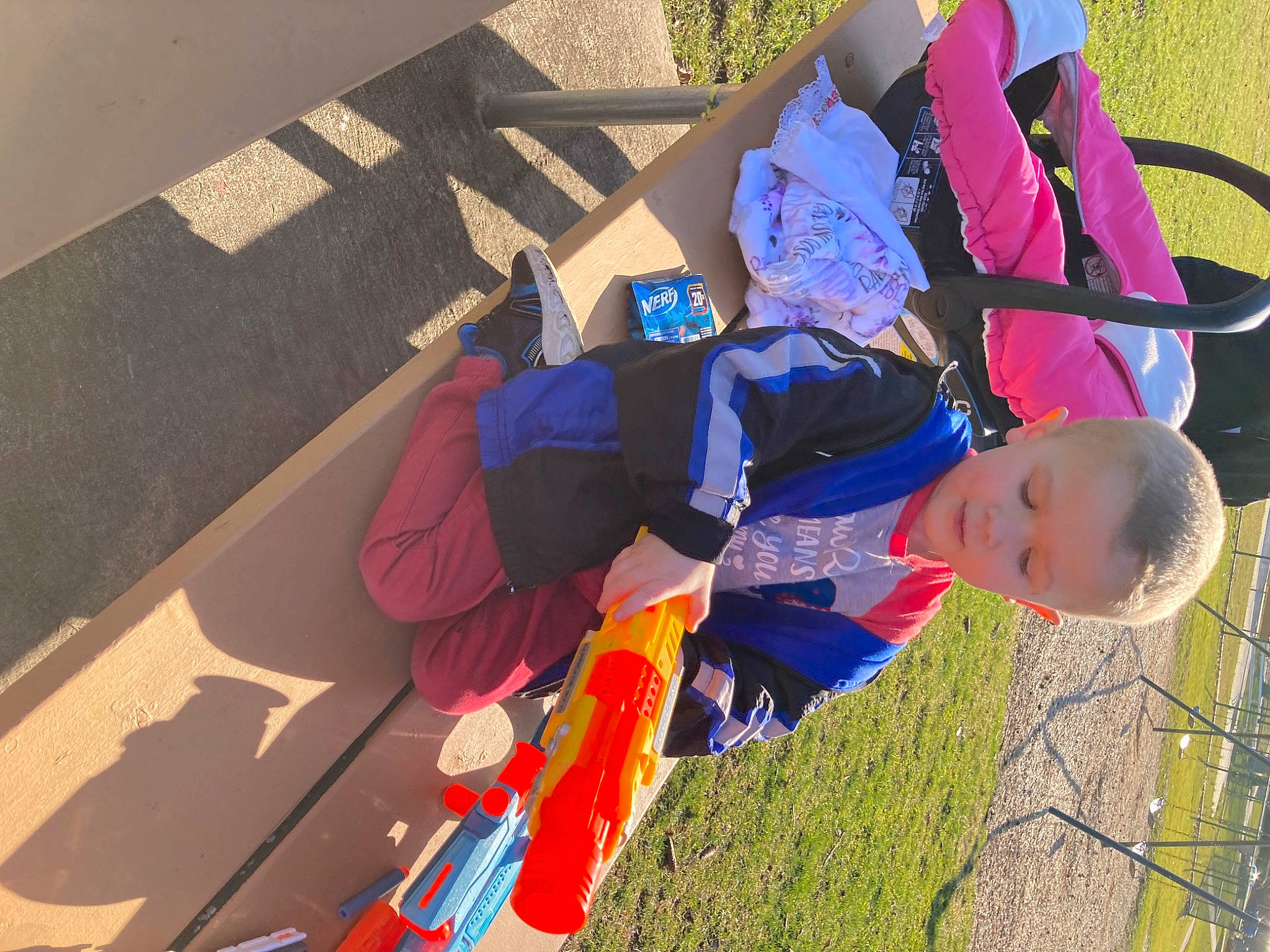 Xavier joined the competition — help win amazing prizes! asphalt, child, electric_blue, flooring, fun, grass, happy, hat, leisure, person, plant, recreation, road_surface, toddler, tree