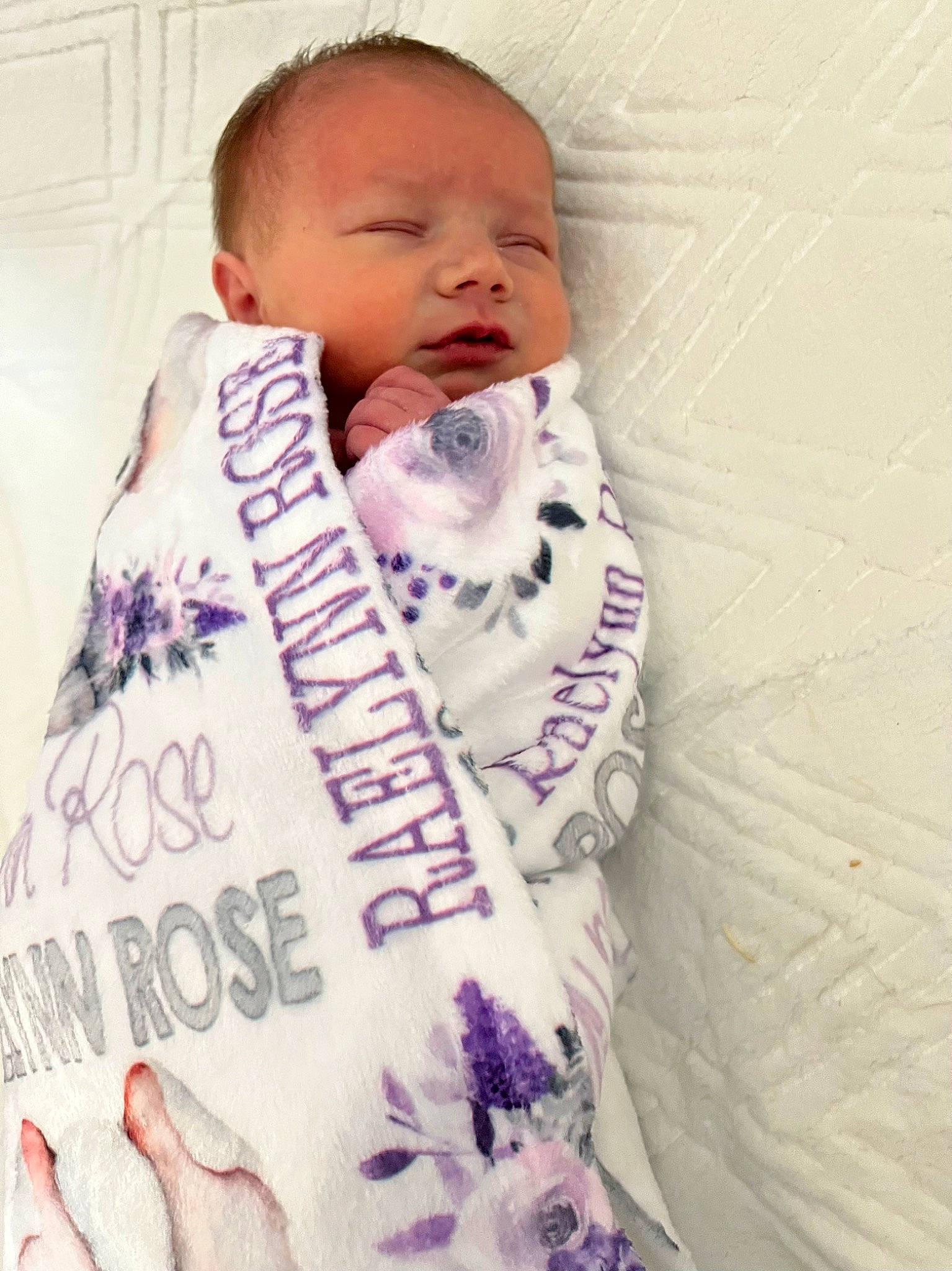 Raelynn is registered to the contest to win money with this photo: baby, baby_products, baby_sleeping, baby_toddler_clothing, child, comfort, facial_expression, finger, font, happy, linens, nail, nose, outerwear, person, pink, skin, sleeve, textile, thumb