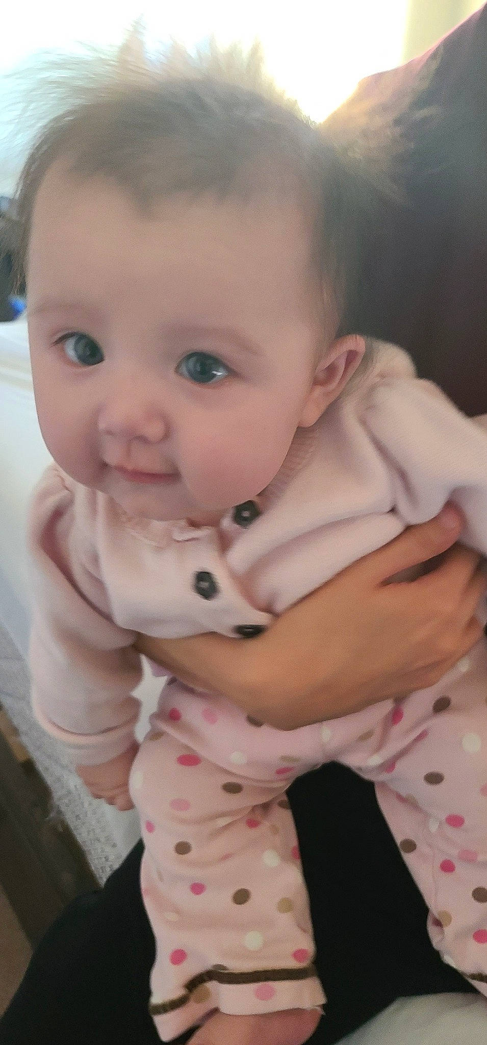 Elaine is registered to the contest to win money with this photo: baby, baby_toddler_clothing, beauty, cheek, child, collar, ear, eyelash, finger, hand, happy, iris, lip, nose, pattern, person, pink, sitting, skin, sleeve