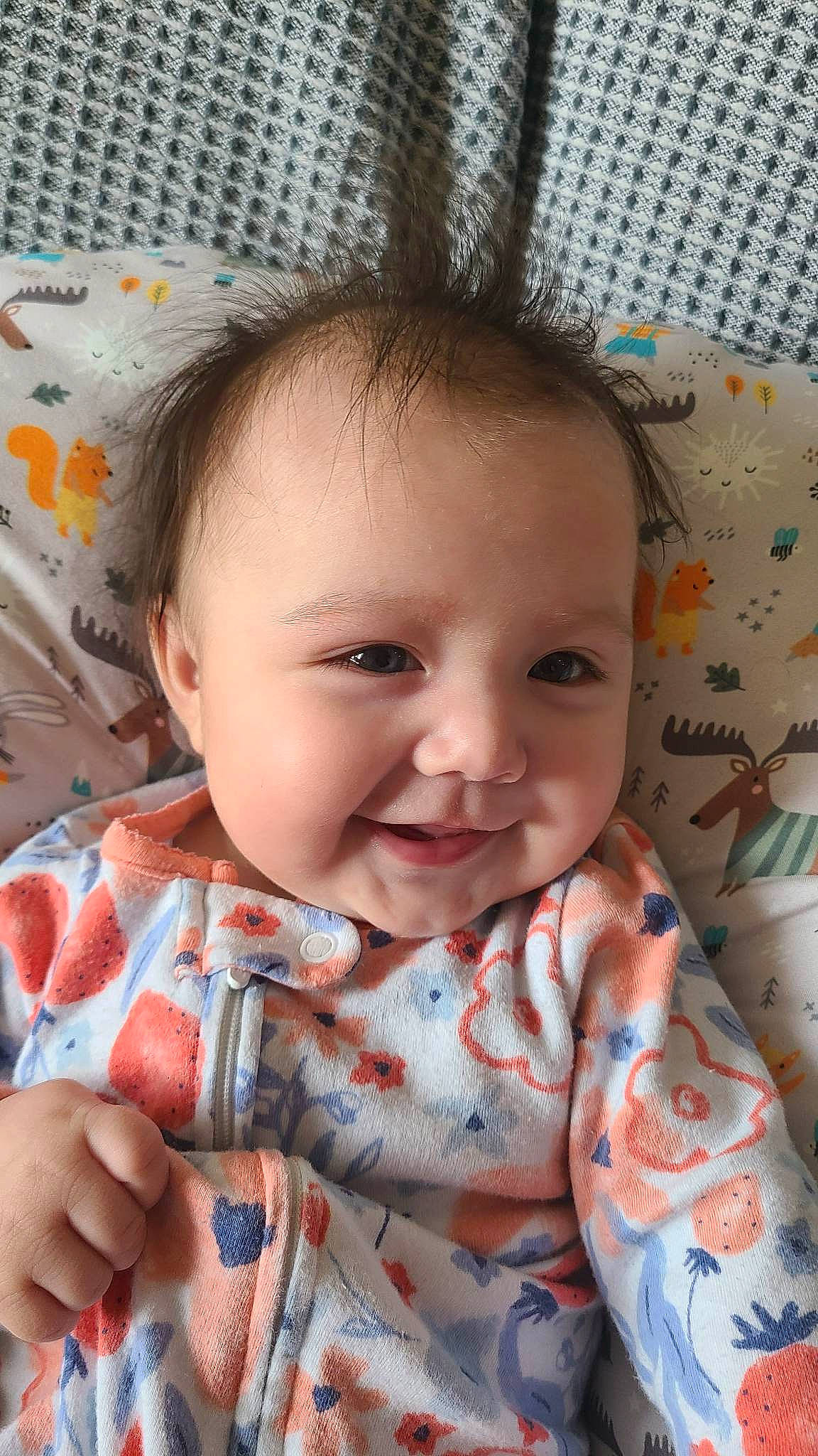 Elaine is registered to the contest to win money with this photo: baby, baby_toddler_clothing, cheek, chin, eye, face, facial_expression, finger, gesture, head, iris, lip, mouth, nose, organ, person, product, skin, smile, textile