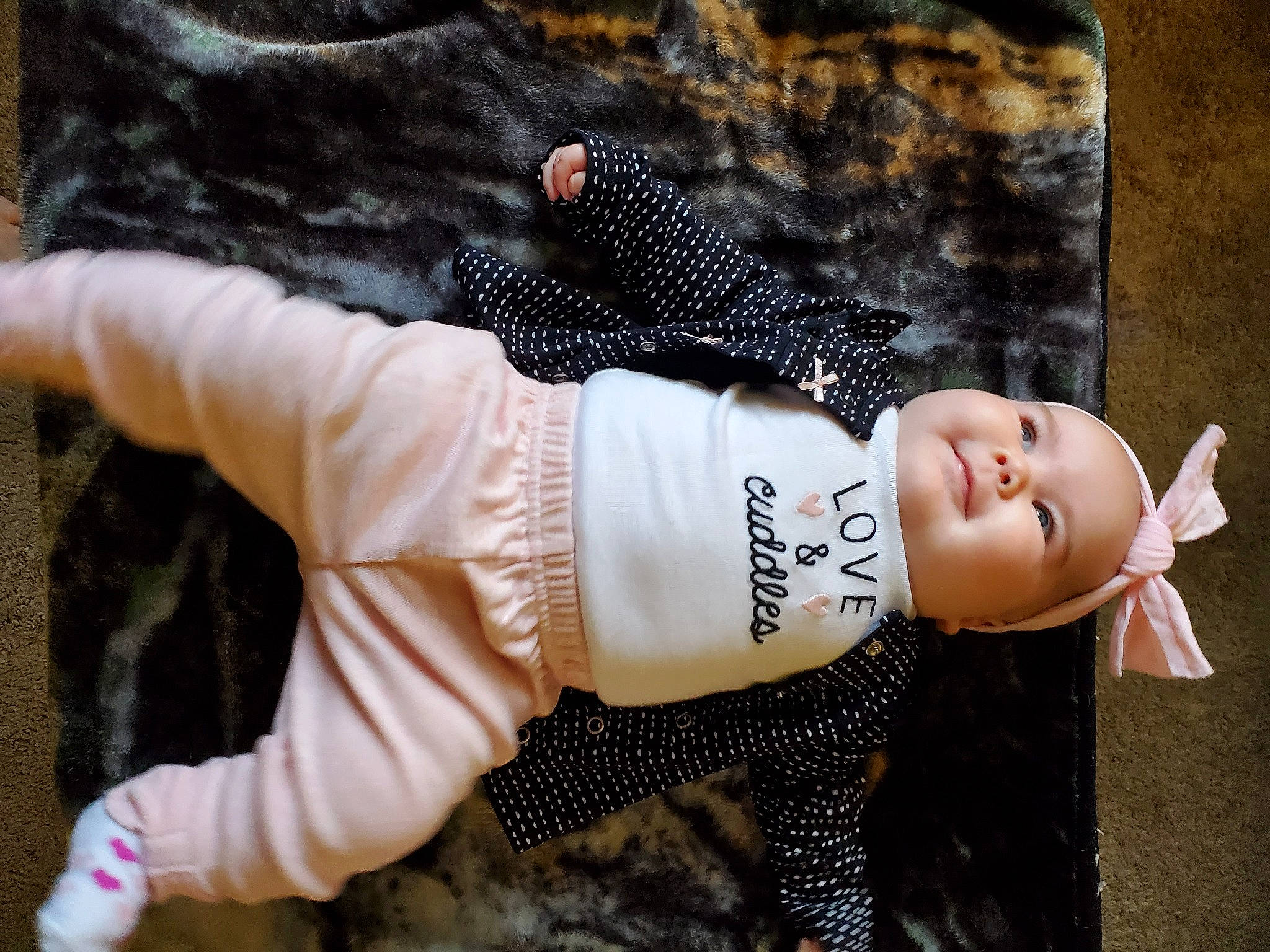 Lilyanne joined the competition — help win amazing prizes! arm, baby_toddler_clothing, child, eyelash, finger, gesture, grass, happy, headgear, headwear, human_body, human_leg, joint, pattern, person, sleeve, street_fashion, t_shirt, textile, thumb