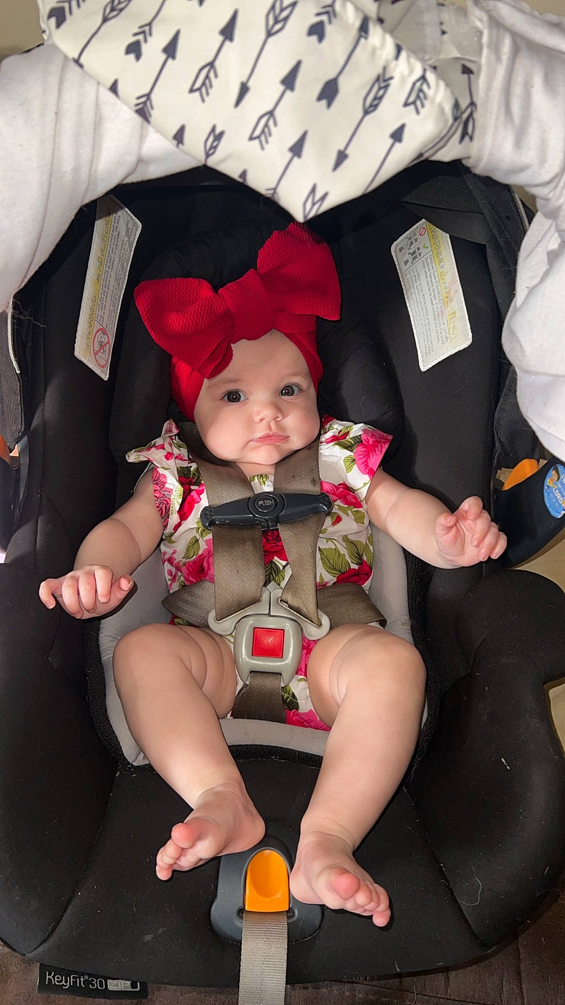 Raelynn joined the competition — help win amazing prizes! baby, baby_toddler_clothing, carmine, chair, child, comfort, event, finger, foot, fun, hand, hat, headwear, human_leg, lap, leg, person, pink, sitting, thigh