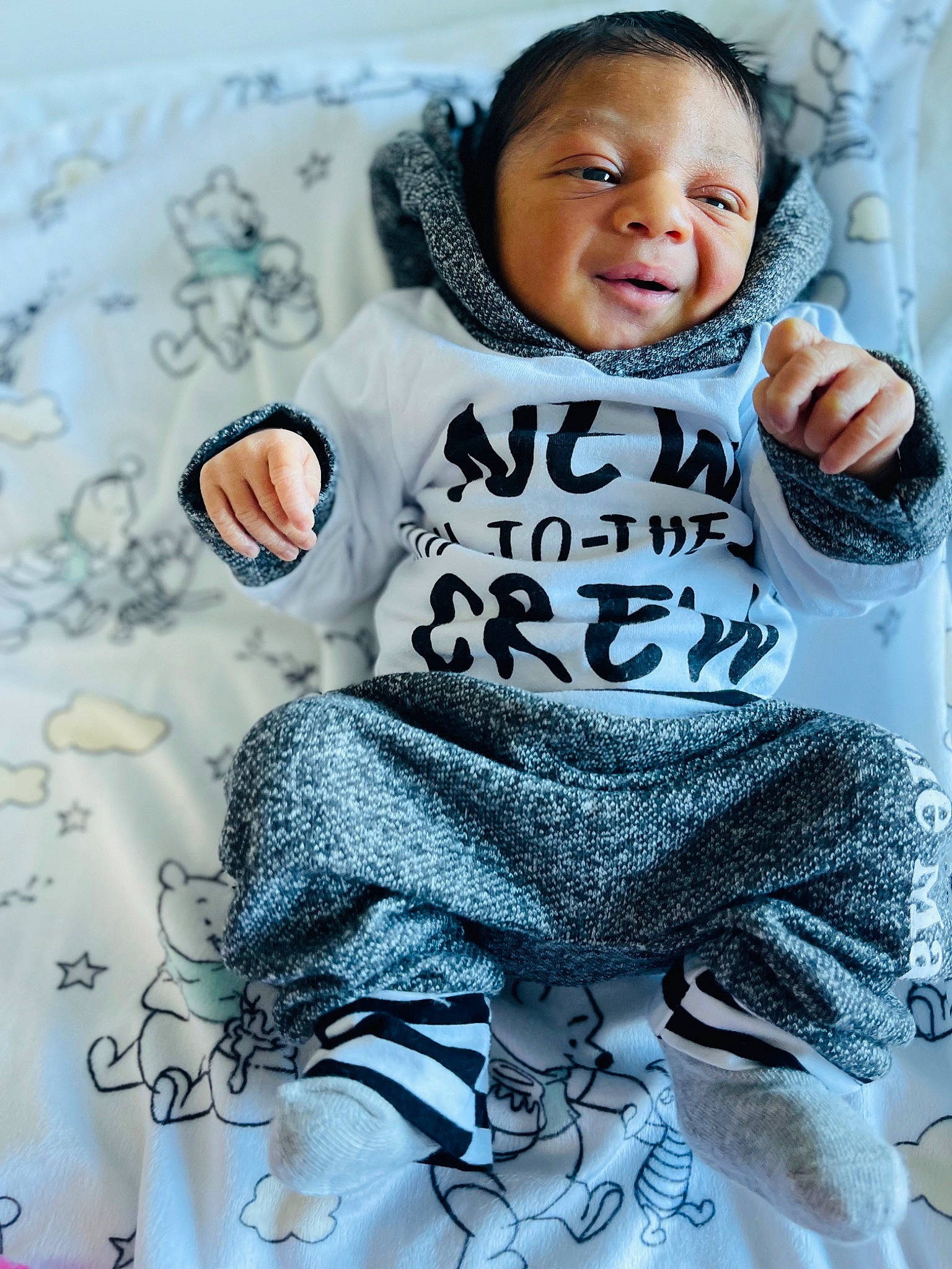 Maijor is registered to the contest to win money with this photo: arm, art, azure, baby, baby_toddler_clothing, chair, child, comfort, cool, eye, flash_photography, happy, outerwear, pattern, person, sitting, sleeve, smile, t_shirt, textile