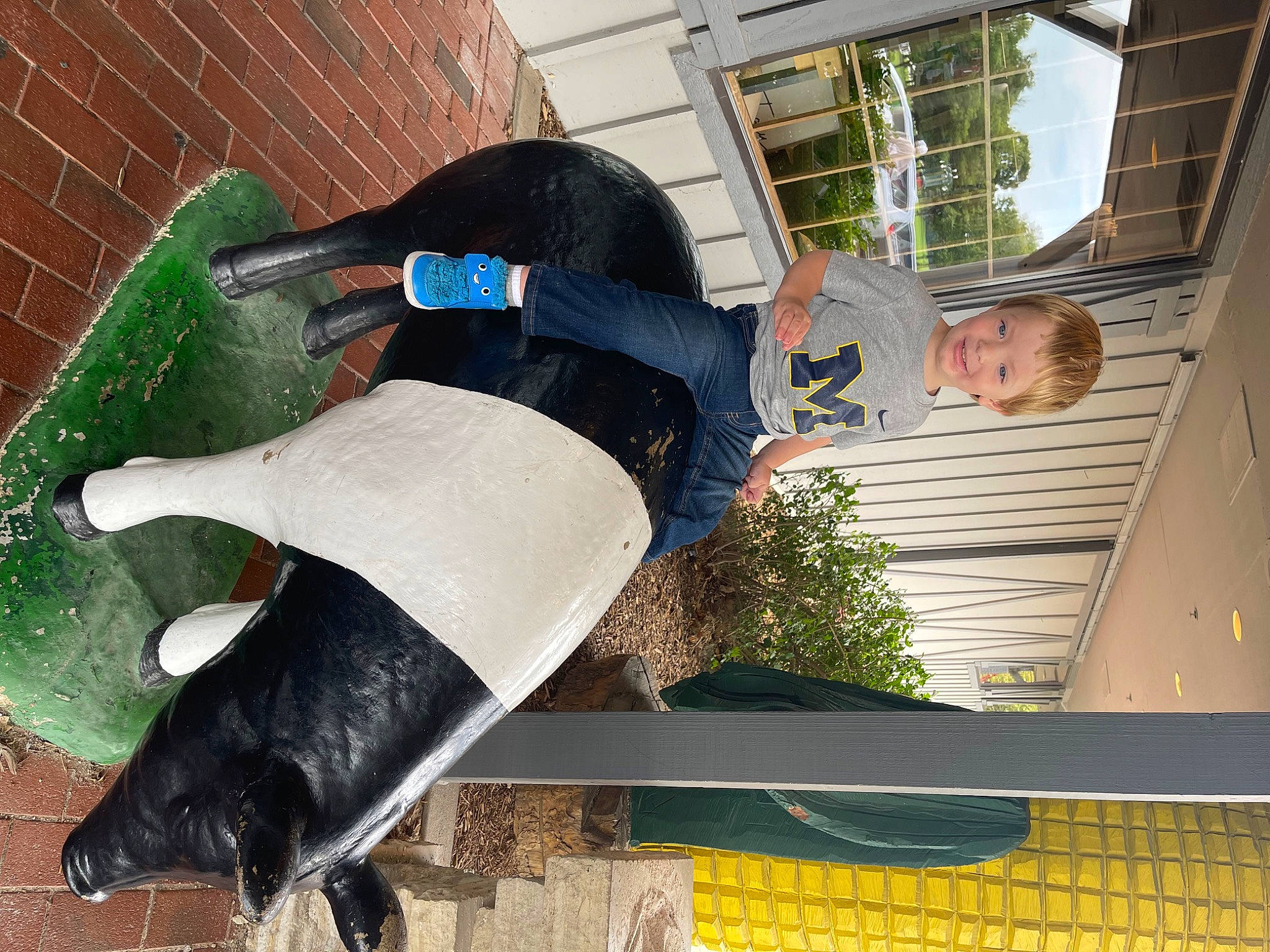 Adam joined the competition — help win amazing prizes! automotive_exterior, brick, bumper, eyewear, green, hat, human_leg, joy, leisure, person, personal_protective_equipment, recreation, t_shirt, tail