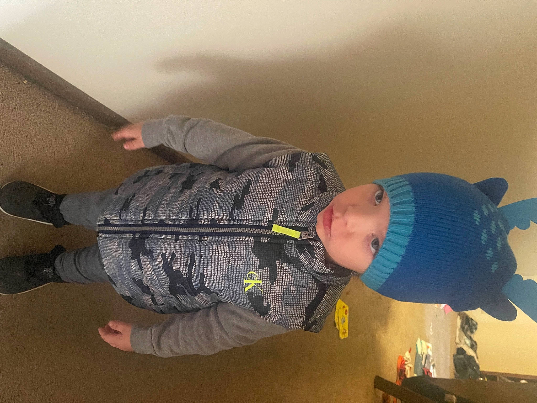 Adam joined the competition — help win amazing prizes! baby, baby_toddler_clothing, child, comfort, elbow, fun, gesture, hat, headwear, knee, military_camouflage, outdoor_shoe, person, personal_protective_equipment, room, sleeve, t_shirt, toddler, walking_shoe