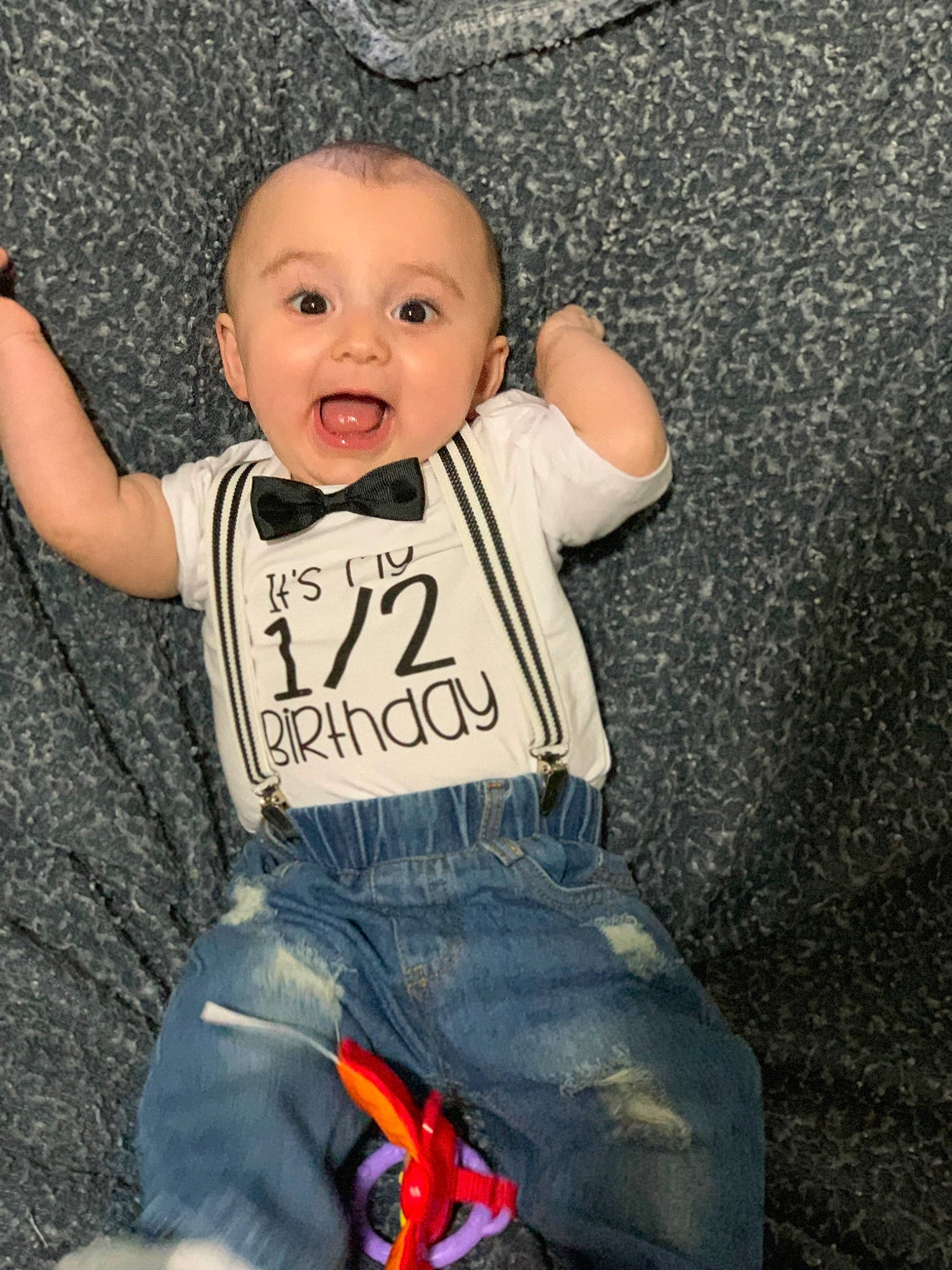 Raylen joined the competition — help win amazing prizes! baby_toddler_clothing, cheek, eye, face, facial_expression, finger, flash_photography, gesture, hand, happy, human_body, jeans, leg, mouth, nose, person, skin, sleeve, smile, standing