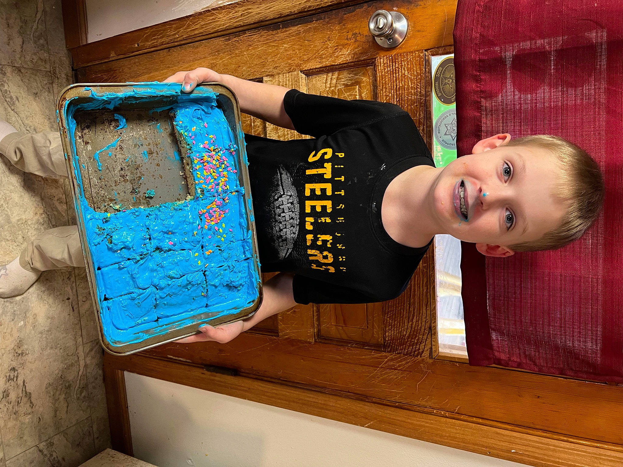 Hunter joined the competition — help win amazing prizes! baby, baby_toddler_clothing, bag, child, door, electric_blue, fun, happy, joy, leisure, luggage_and_bags, person, play, rectangle, room, sitting, smile, toddler, travel, wood