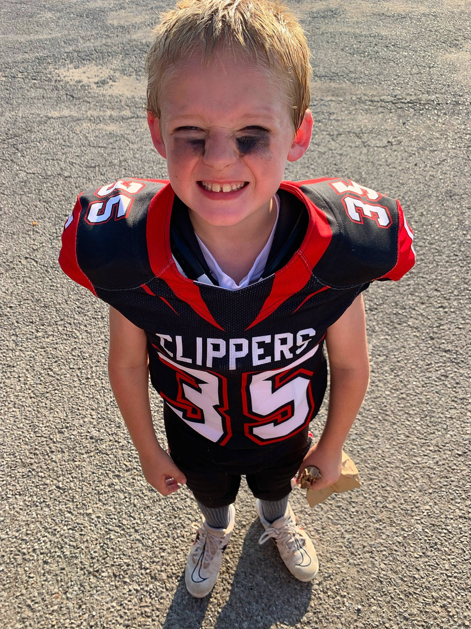 Hunter is registered to the contest to win money with this photo: baby_toddler_clothing, cool, electric_blue, face, fun, happy, head, human_body, human_leg, jersey, joy, person, player, recreation, shorts, sleeve, smile, sports_uniform, sportswear, t_shirt