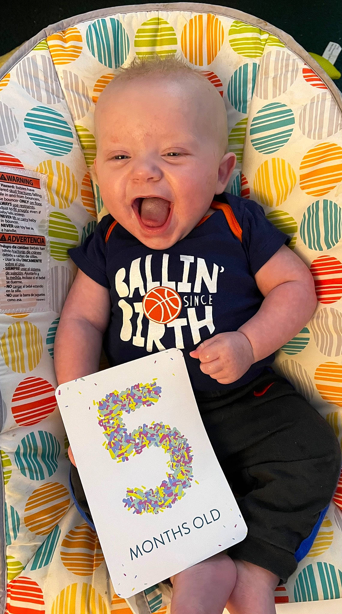 Payton joined the competition — help win amazing prizes! art, baby, baby_toddler_clothing, cheek, child, facial_expression, fun, happy, linens, orange, pattern, person, play, publication, room, sleeve, smile, t_shirt, toddler, top