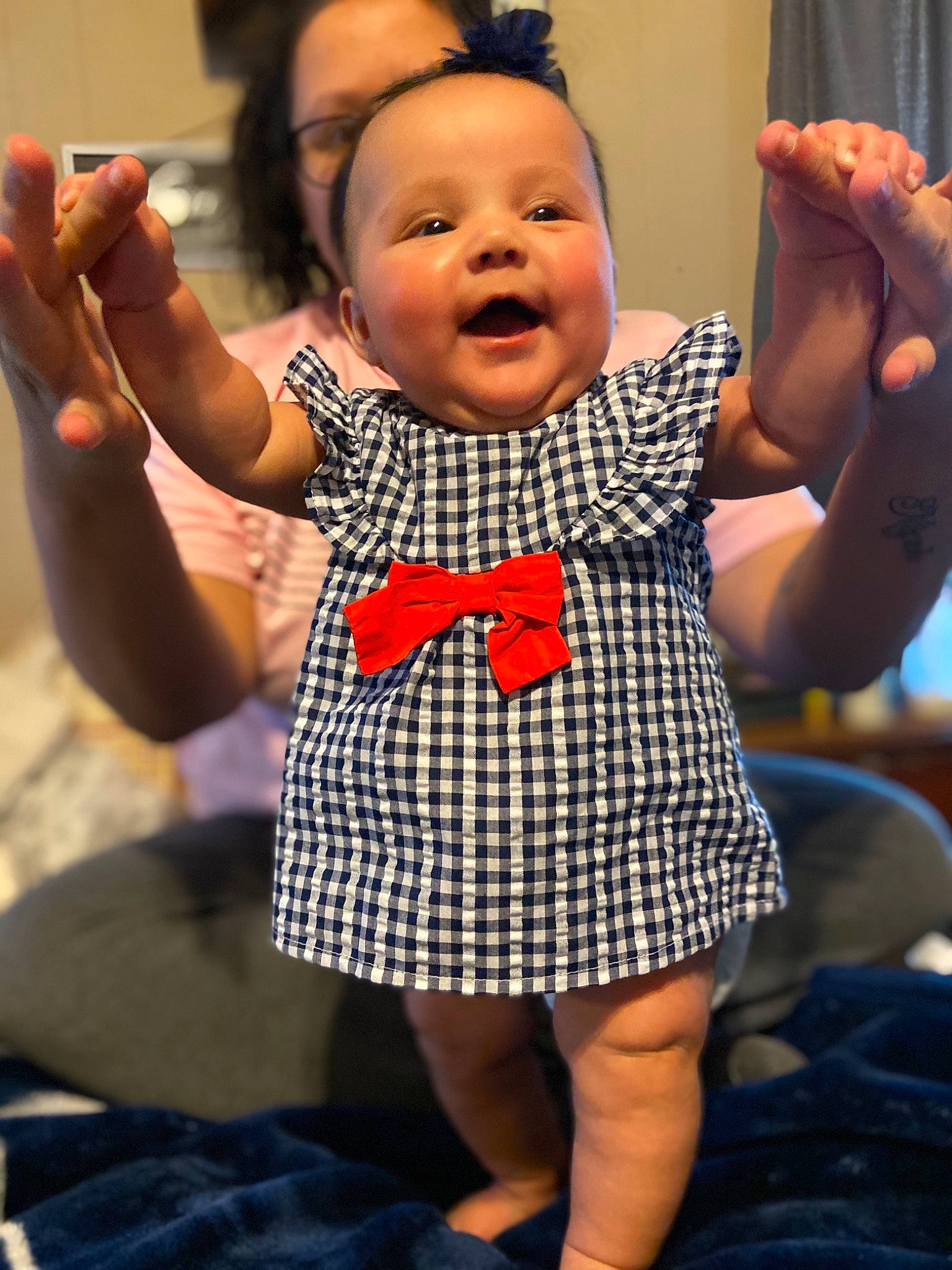 Rosalee is registered to the contest to win money with this photo: baby, baby_toddler_clothing, cheek, child, finger, fun, gesture, hand, happy, head, human, nail, people, person, photograph, purple, skin, smile, snapshot, thumb