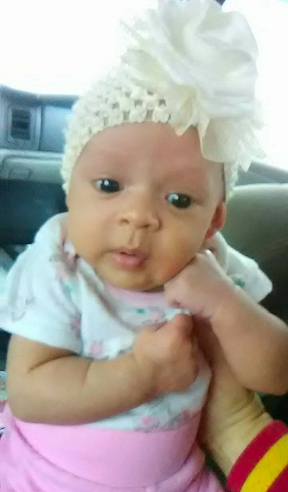 Harleen is registered to the contest to win money with this photo: boy, cheek, child, day, eyebrow, face, facial_expression, hair, hair_accessory, head, headgear, human_hair_color, infant, mouth, nose, person, pink, product, skin, smile