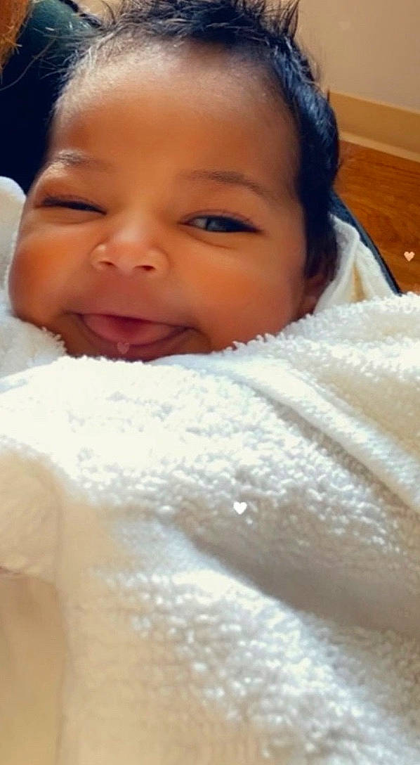 Indy is registered to the contest to win money with this photo: baby, beauty, black_hair, cheek, child, chin, close_up, eye, eyebrow, face, facial_expression, forehead, head, lip, mouth, neck, nose, person, skin, smile