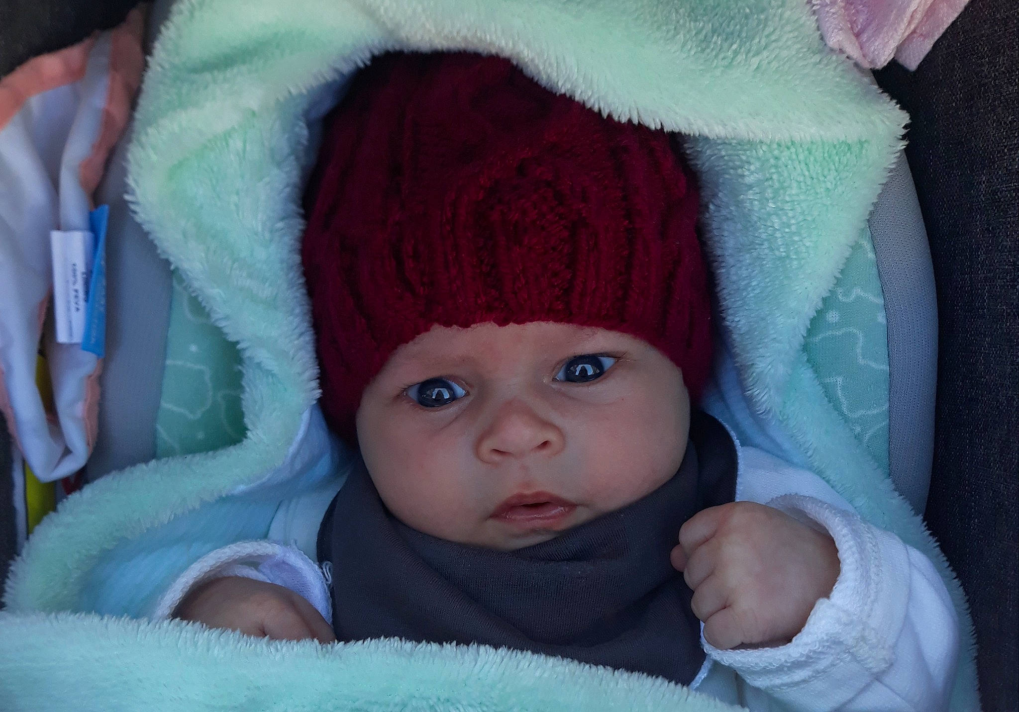 Célia participe au concours pour gagner de l'argent avec cette photo : baby, cheek, child, eye, head, headgear, headwear, linens, person, skin, toddler