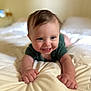 baby, child, smiling, crawling, bed, blanket, hands, face, blue_eyes, infant, cute, soft_light, indoor, young_child, happy, person, skin, hair, clothing, portrait