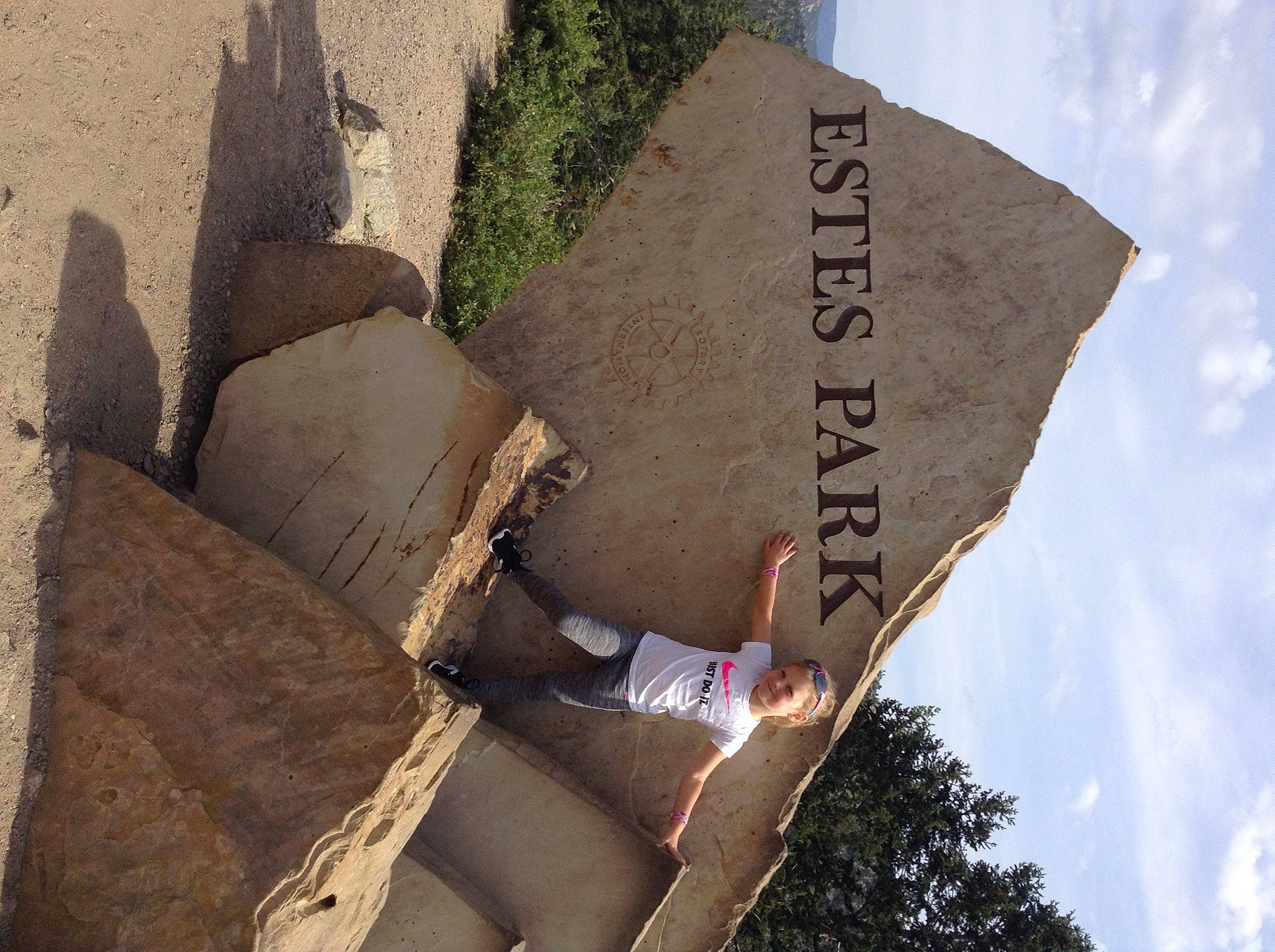 Arianna joined the competition — help win amazing prizes! art, building, cloud, concrete, dress, facade, flag, font, human_leg, joy, landscape, leg, leisure, person, plant, rock, shadow, sky, thigh, travel