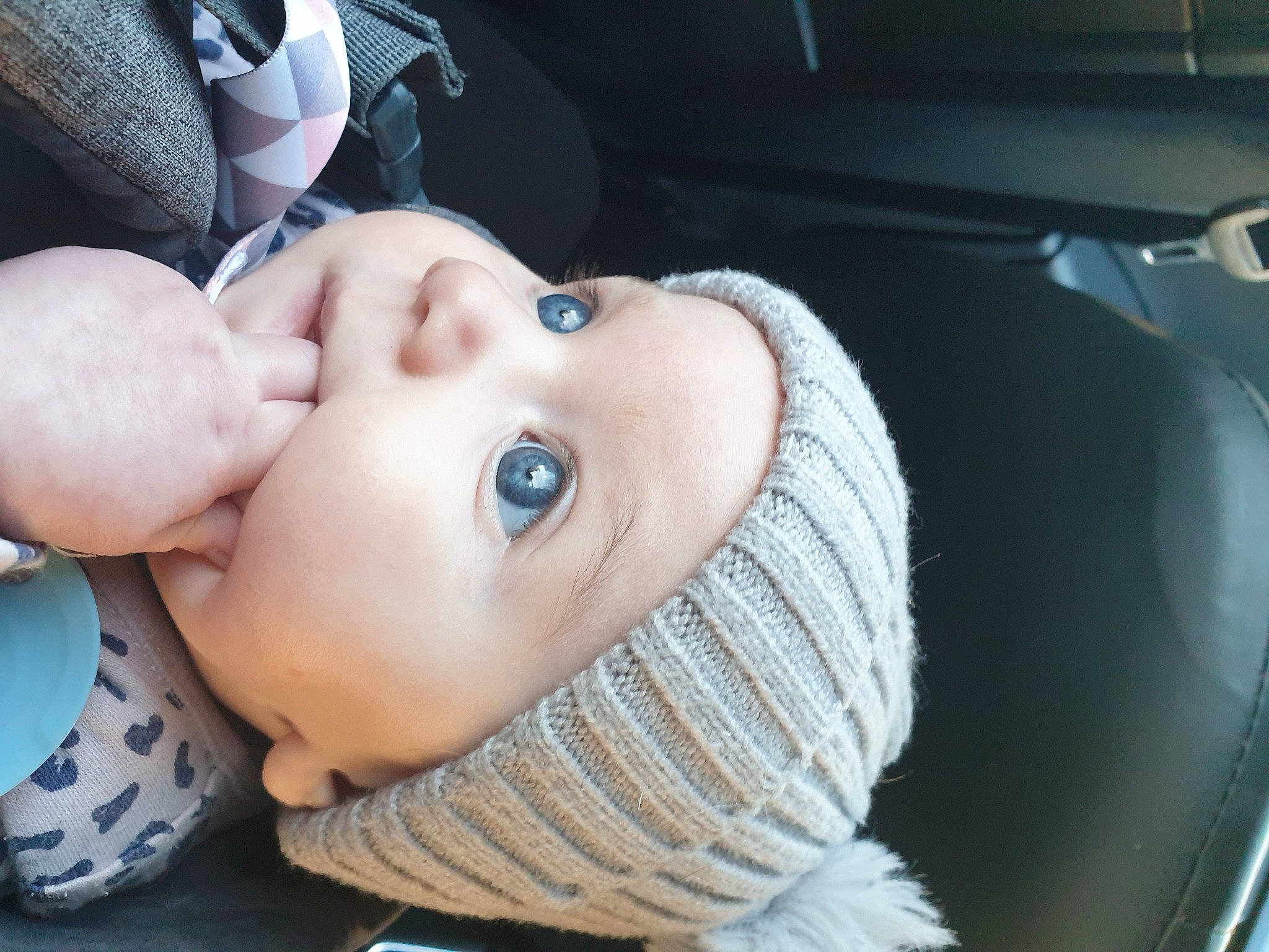 Malia is registered to the contest to win money with this photo: auto_part, baby, baby_toddler_clothing, car_seat, cheek, child, comfort, cool, eyebrow, eyelash, fashion_accessory, flash_photography, fun, happy, headgear, headwear, lip, mouth, nose, person