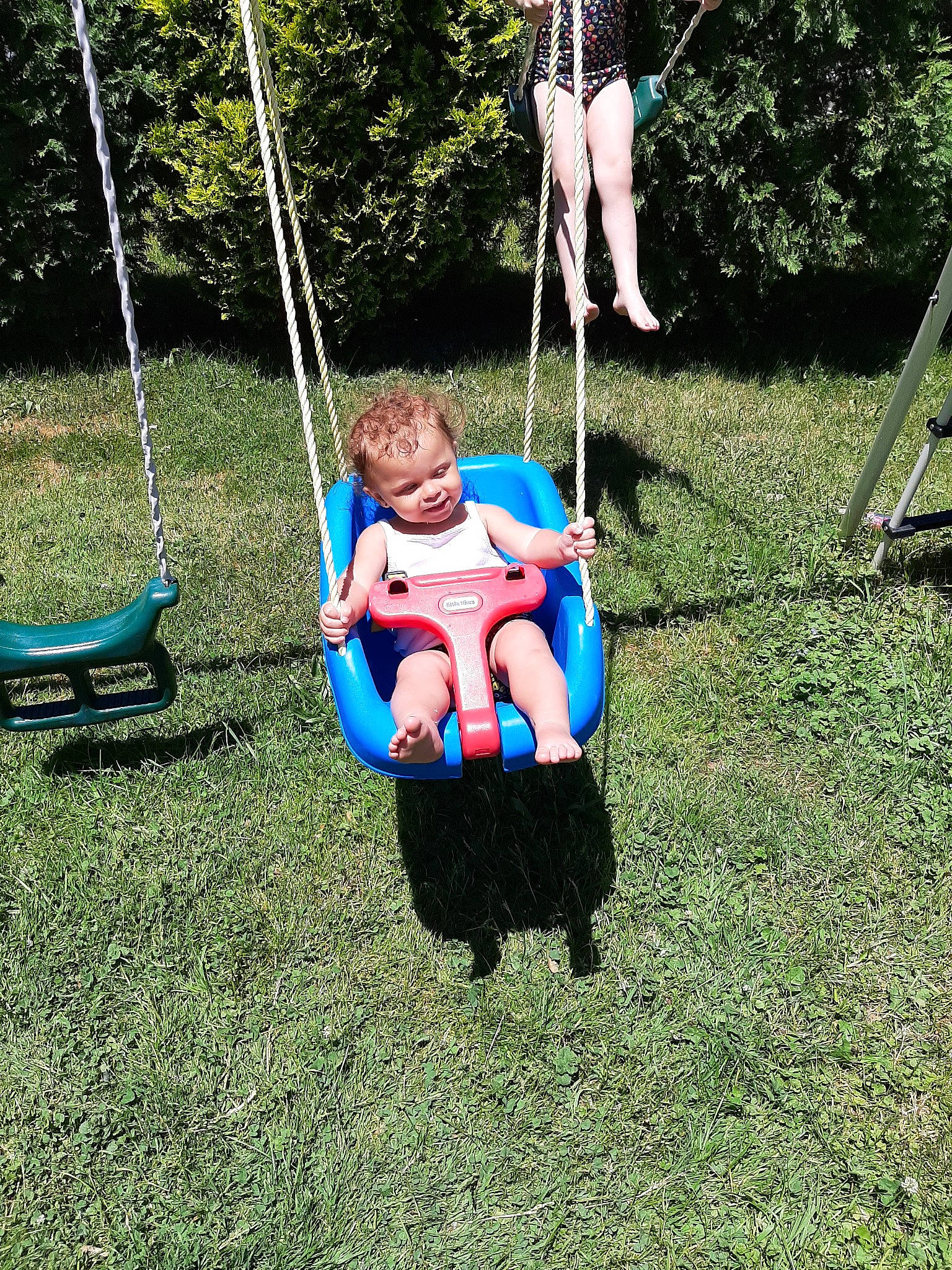 Jazlyn joined the competition — help win amazing prizes! child, fun, grass, leisure, outdoor_play_equipment, person, plant, play, playground, summer, swing, toddler, tree, vacation