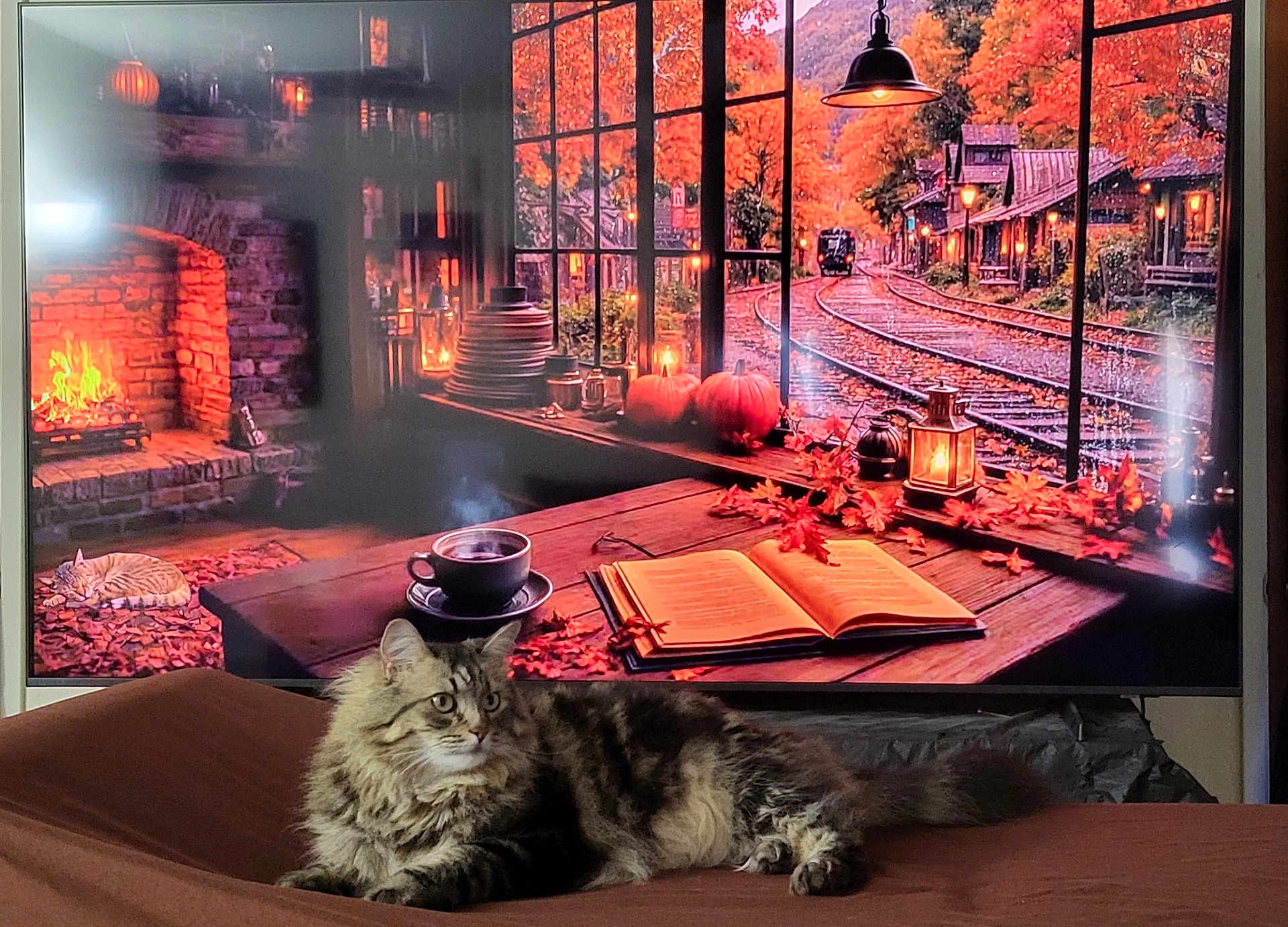 Mavis joined the competition — help win amazing prizes! cat, fluffy_cat, tabby_cat, indoor, cozy, autumn, fireplace, pumpkins, book, cup, steam, table, leaves, lantern, window, railroad_tracks, fall_foliage, orange, brown, relaxing