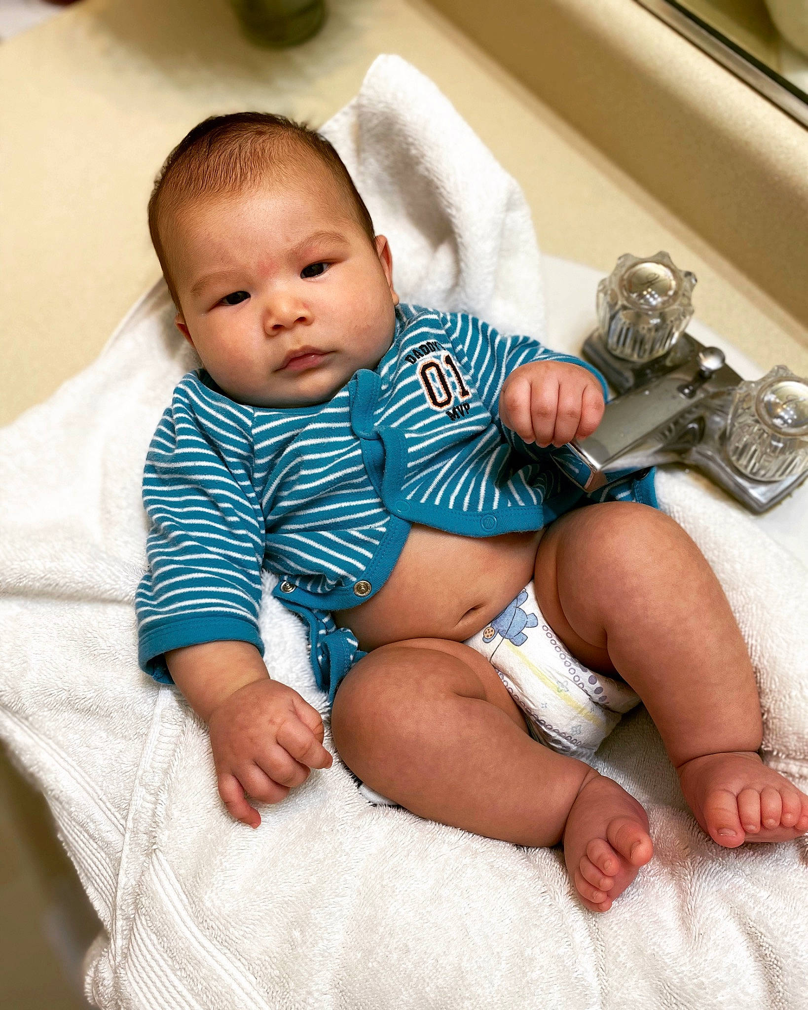 Gael is registered to the contest to win money with this photo: baby, baby_products, baby_sleeping, baby_toddler_clothing, cheek, child, leg, person, product, sitting, skin, toddler