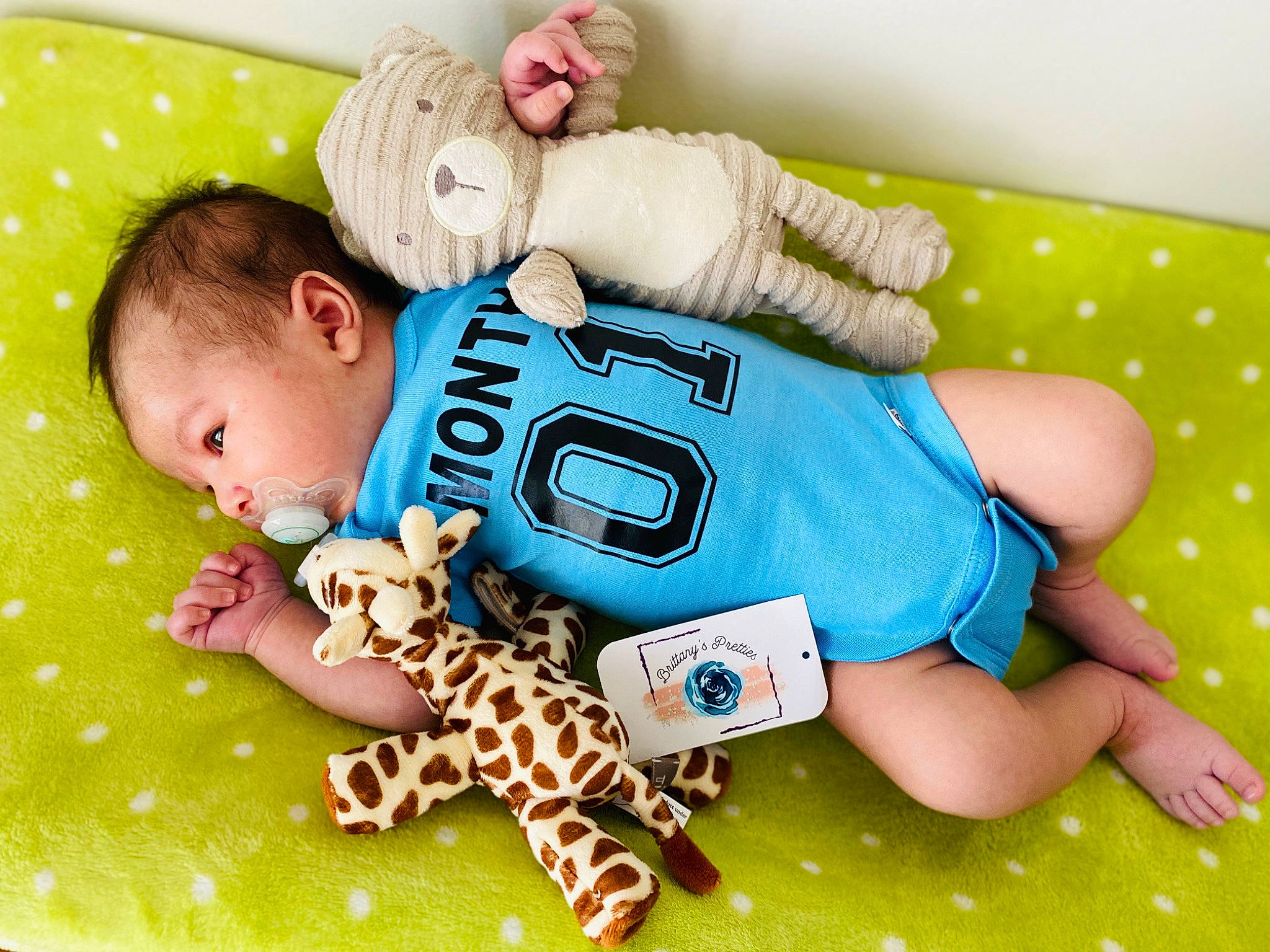 Gael joined the competition — help win amazing prizes! baby, baby_playing_with_toys, baby_products, baby_sleeping, baby_toddler_clothing, baby_toys, child, giraffe, person, play, product, sleep, stuffed_toy, toddler, toy