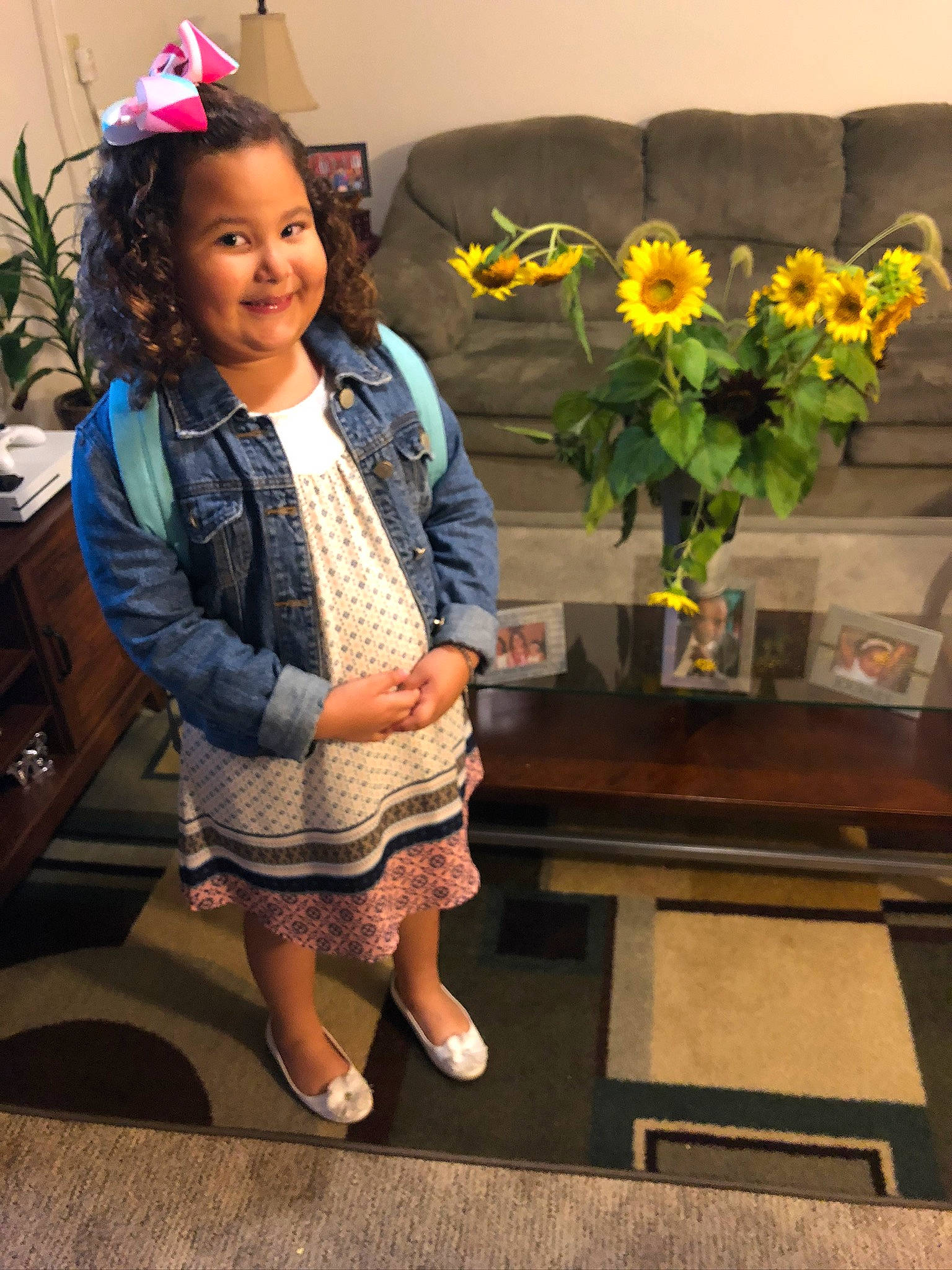 Rosa joined the competition — help win amazing prizes! child, child_model, fawn, flower, joy, outerwear, person, plant, sitting, smile, yellow