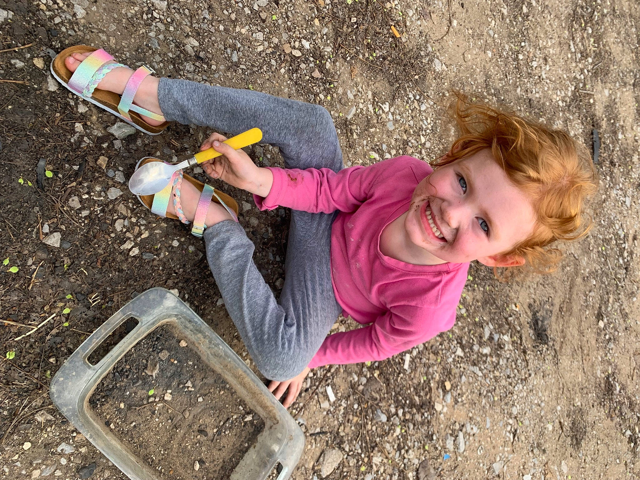 Aubrey is registered to the contest to win money with this photo: adventure, boot, child, fun, grass, happy, joy, landscape, leg, leisure, outdoor_play_equipment, people_in_nature, person, play, recreation, sand, smile, sneakers, soil, toddler