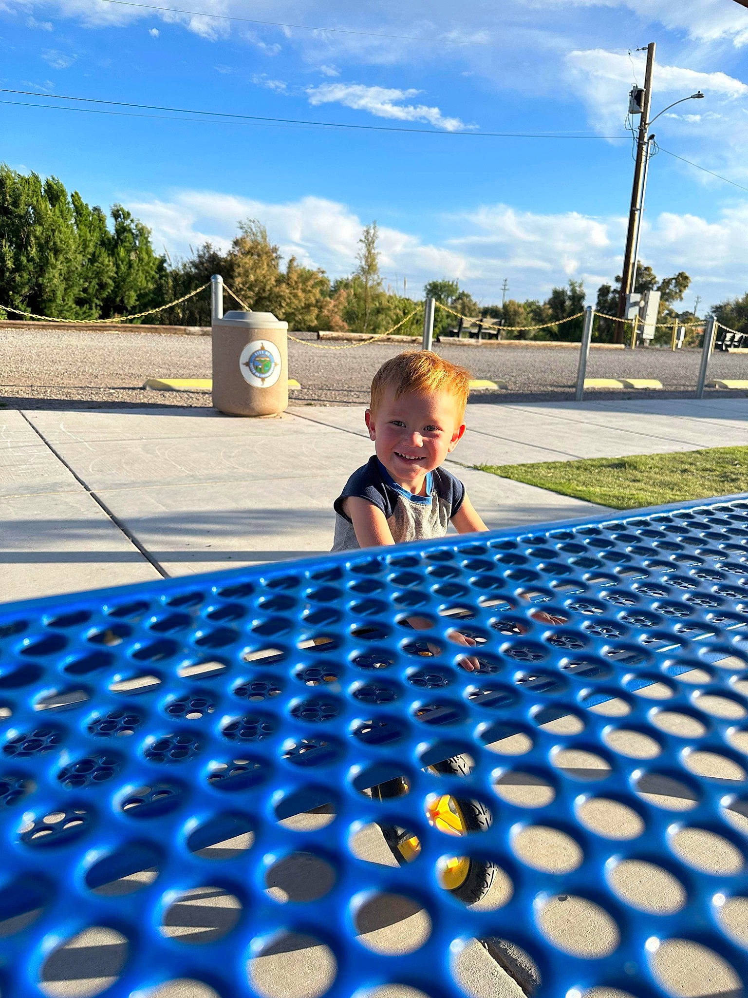 Logan joined the competition — help win amazing prizes! asphalt, azure, blue, child, cloud, daytime, electric_blue, flooring, fun, grass, joy, leisure, line, pattern, person, recreation, road_surface, sky, sunglasses, sunlight