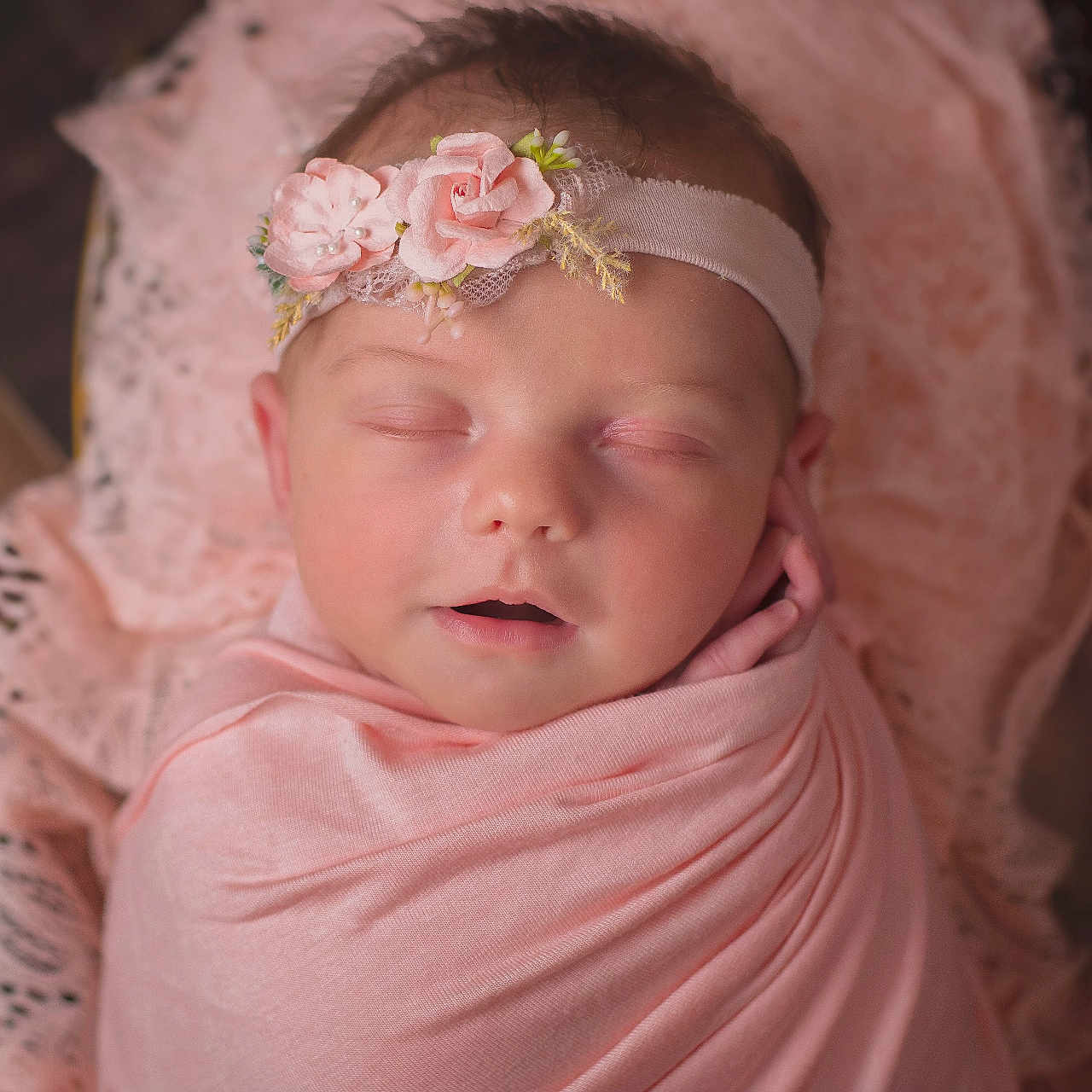 Aroura is registered to the contest to win money with this photo: accessories, baby, bodypart, bonnet, clothing, dress, face, finger, flower, flowerarrangement, flowerbouquet, hand, hat, head, headband, newborn, person, photography, plant, portrait
